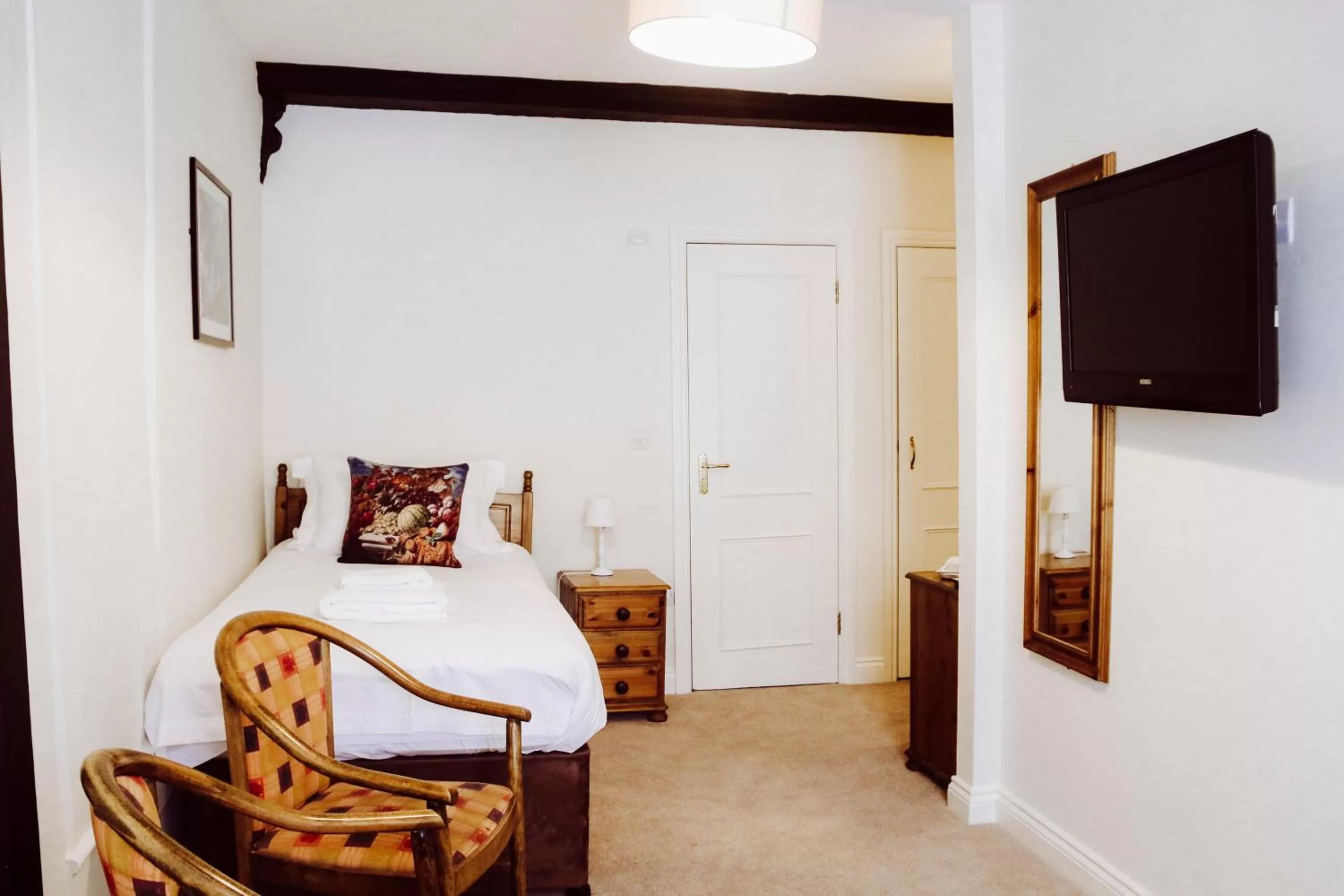 Bed in The Old Crown Coaching Inn