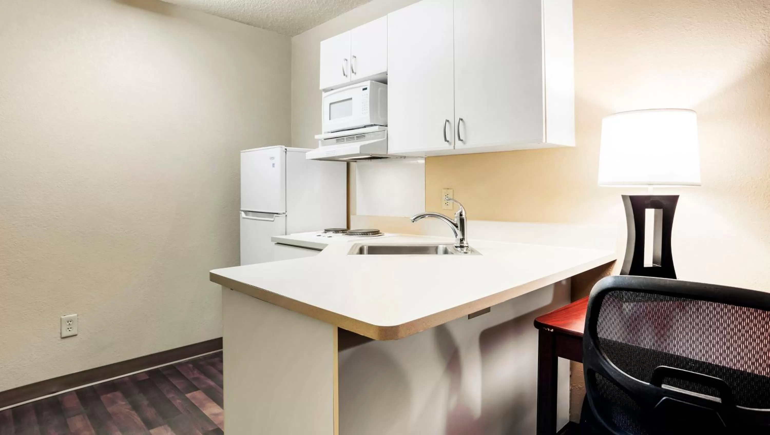 Kitchen or kitchenette in Home 1 Suites Extended Stay