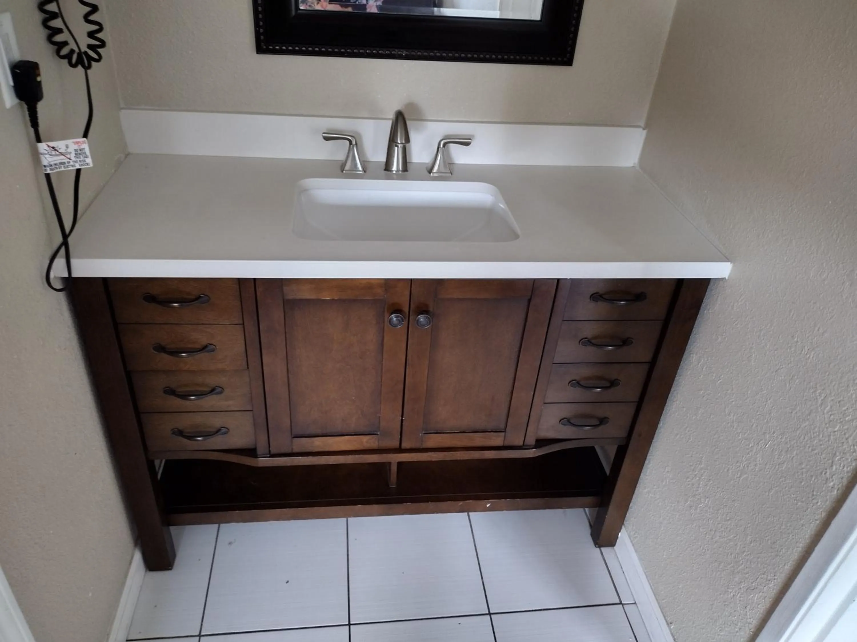 Bathroom in Capital O Hotel Richmond Hill/Savannah area I-95