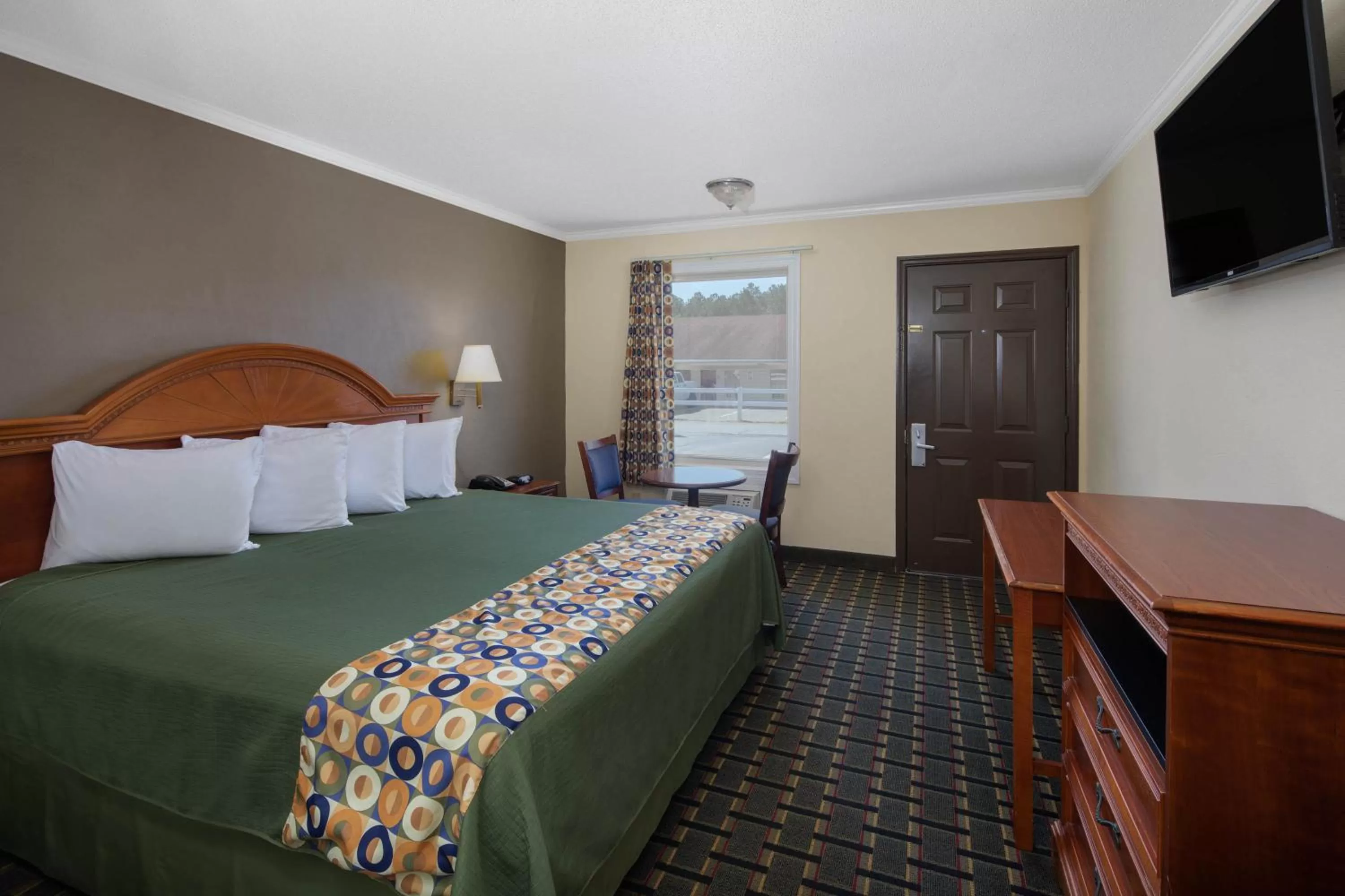 Bed in Travelodge by Wyndham Orangeburg