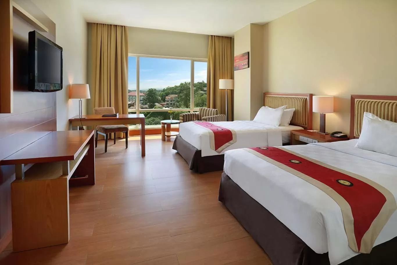 Photo of the whole room, Bed in Swiss-Belhotel Maleosan Manado