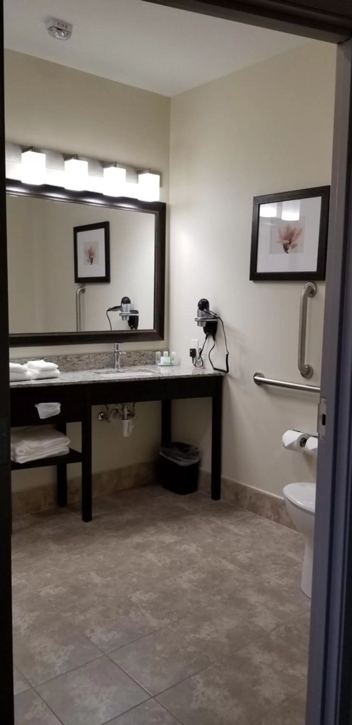 Bathroom in AmericInn by Wyndham Sioux Falls North