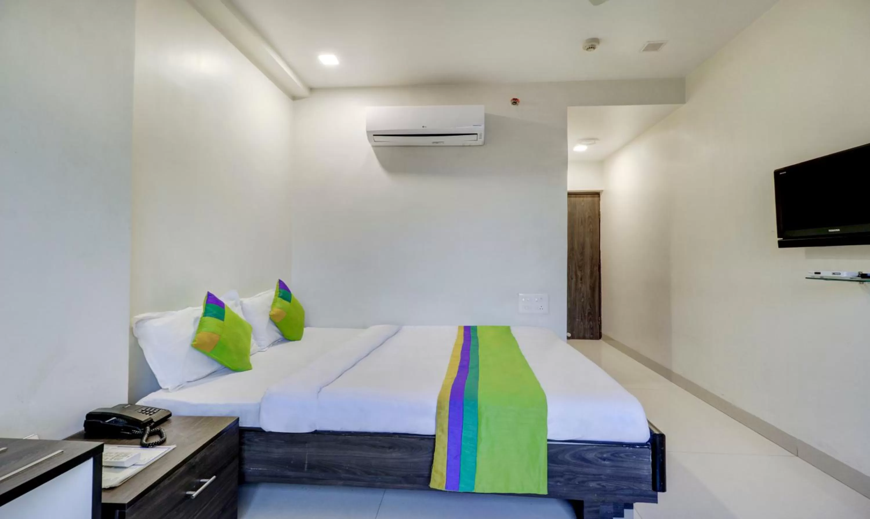 Bed in Treebo Trend Orange City