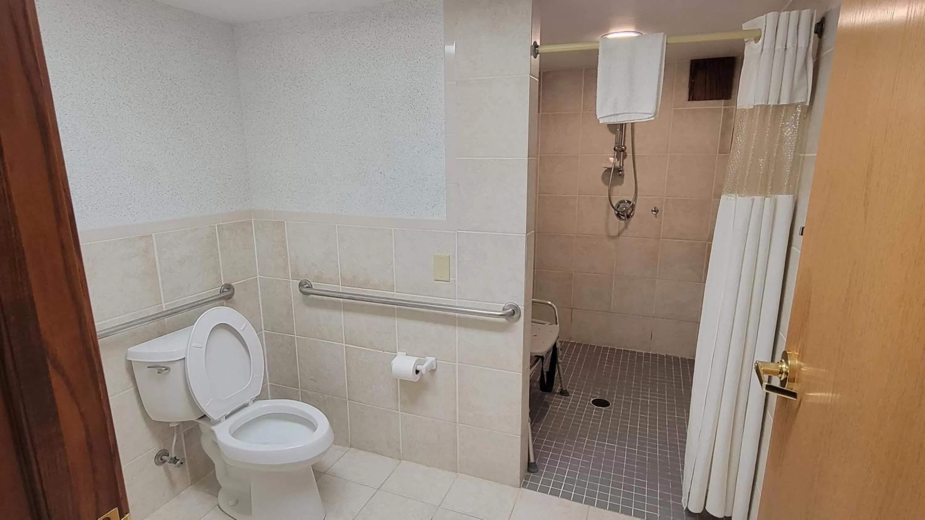 Bathroom in Ramada by Wyndham Saginaw Hotel & Suites