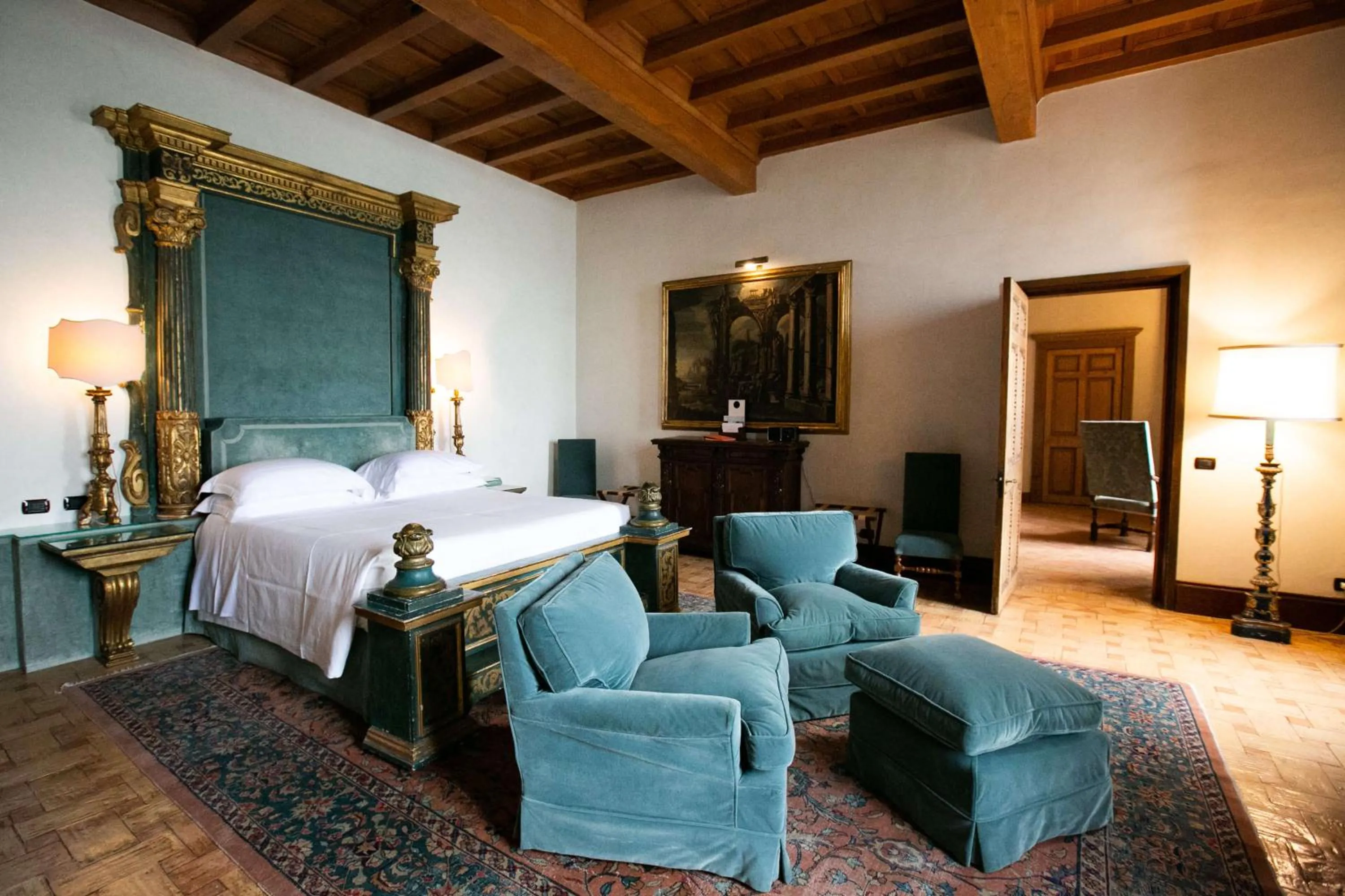 Living room, Bed in La Posta Vecchia Hotel