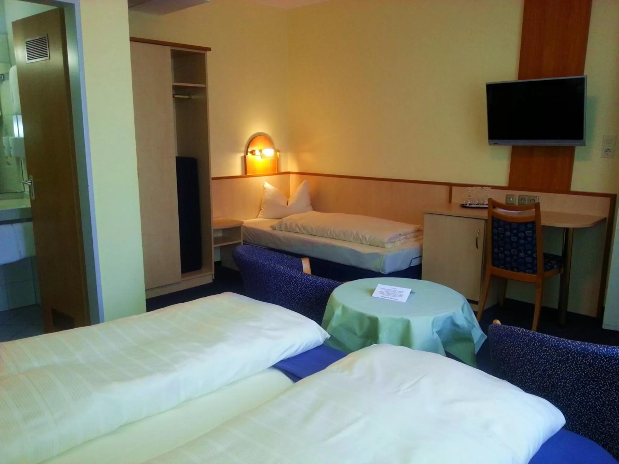 Bed in City Partner Hotel Strauss