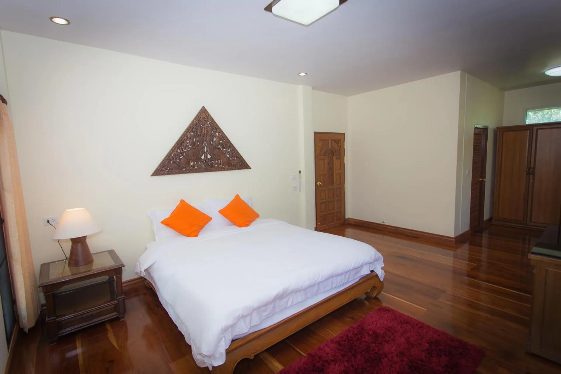 Bed in Thararin Villa