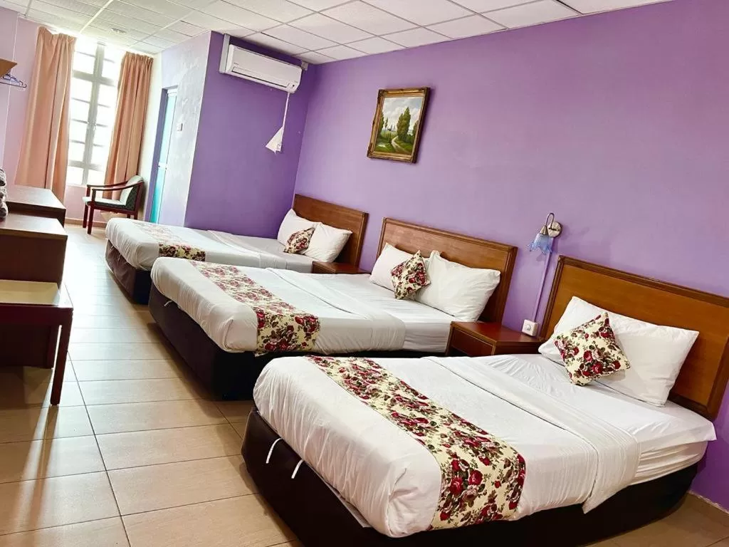 Bed in HOTEL D VIEW MERSING