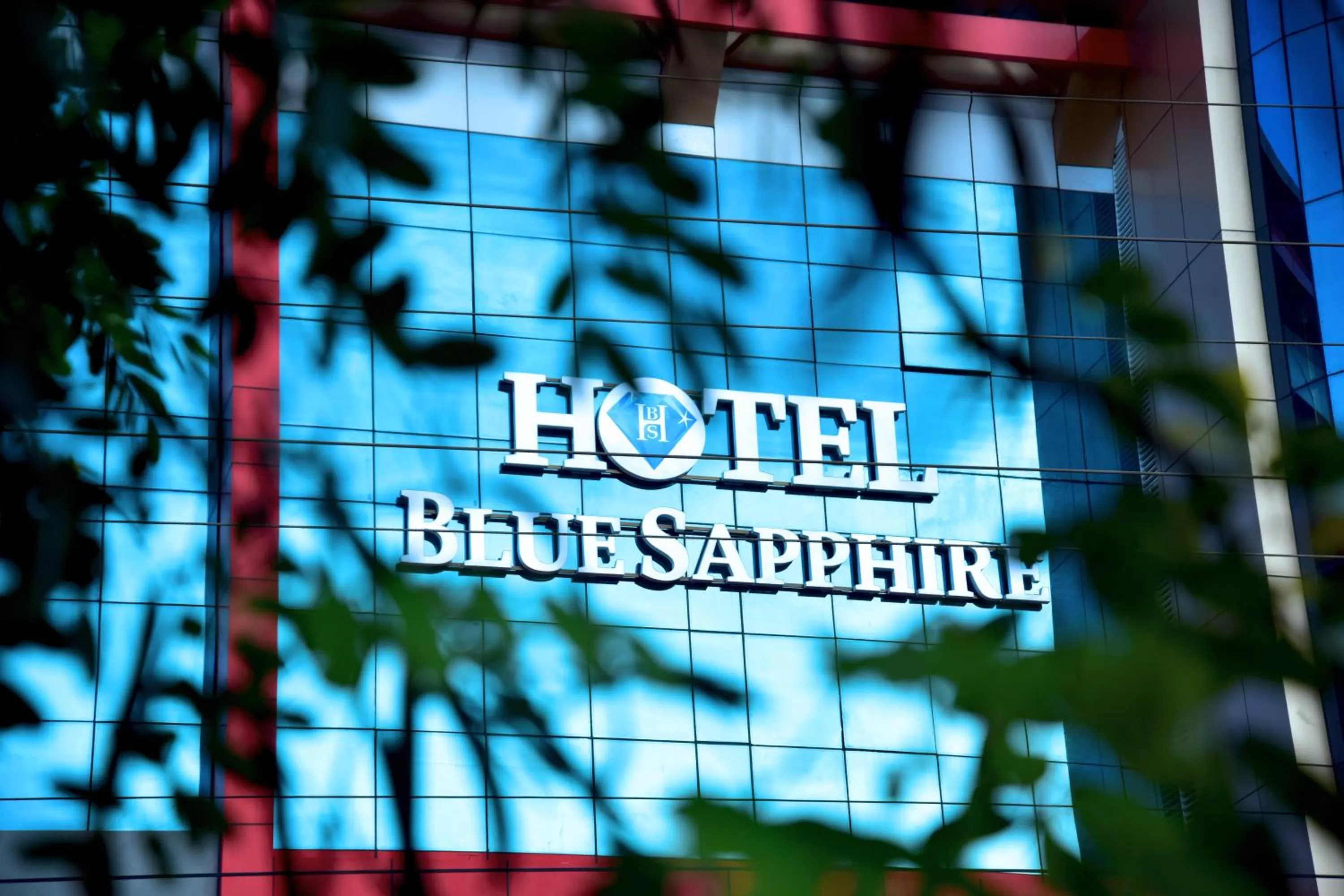 Property logo or sign in Hotel Blue Sapphire