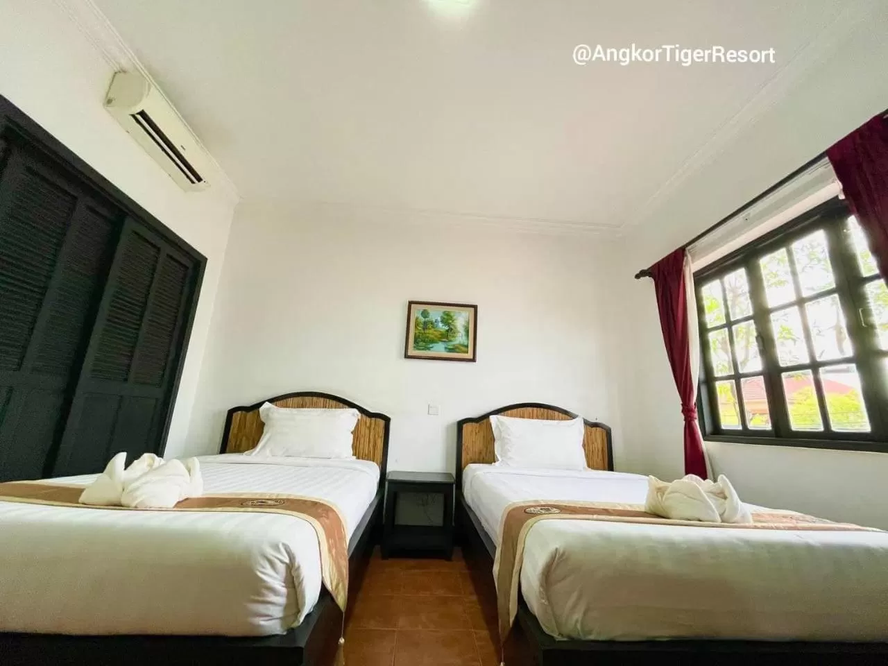 Bed in Angkor Tiger Resort