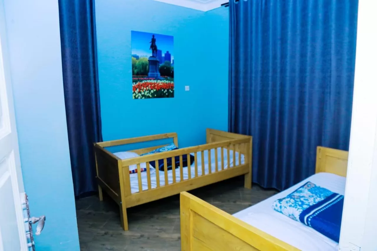 Bed in Karibu Namugongo