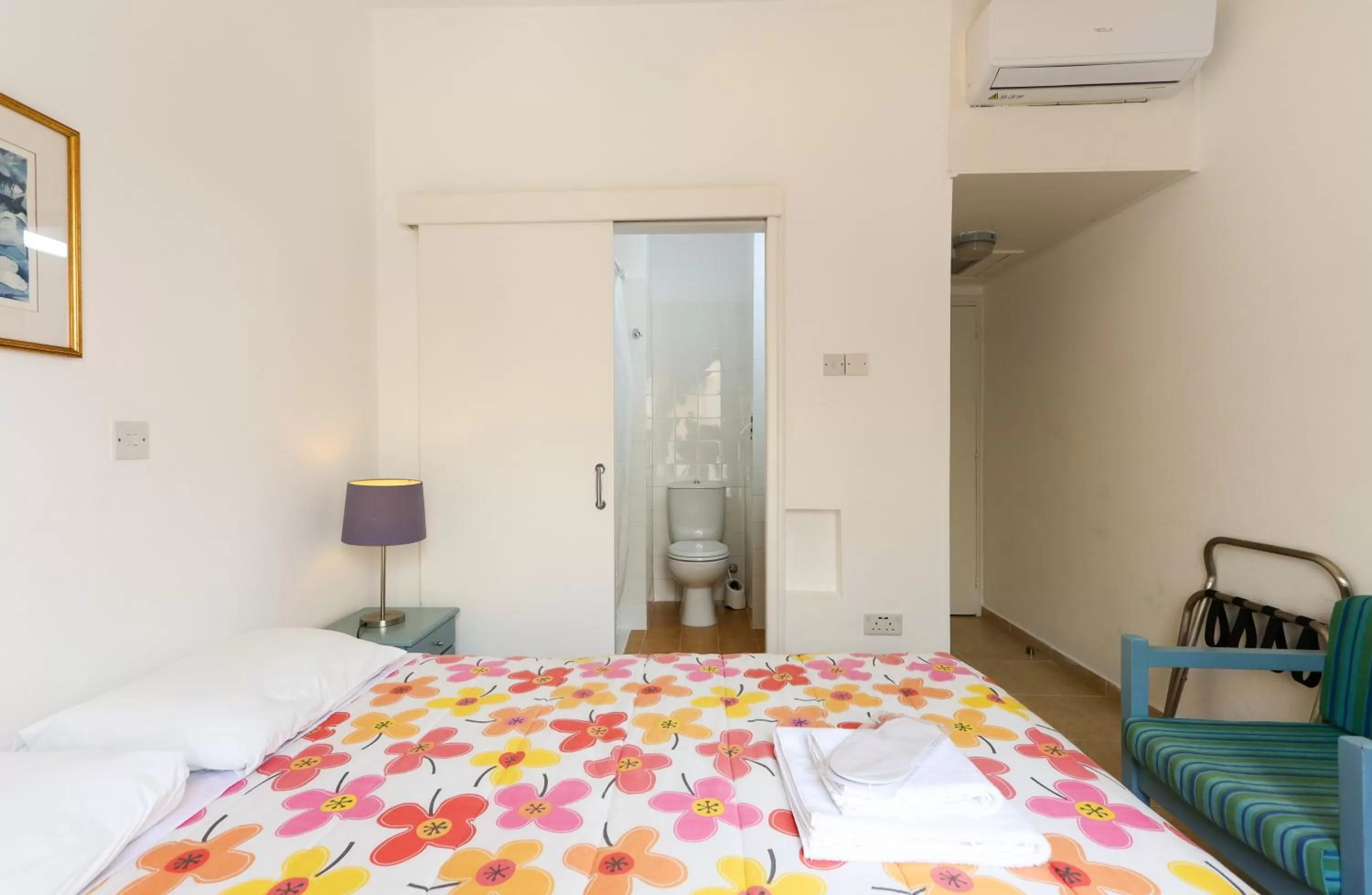 Bed in Axiothea Hotel