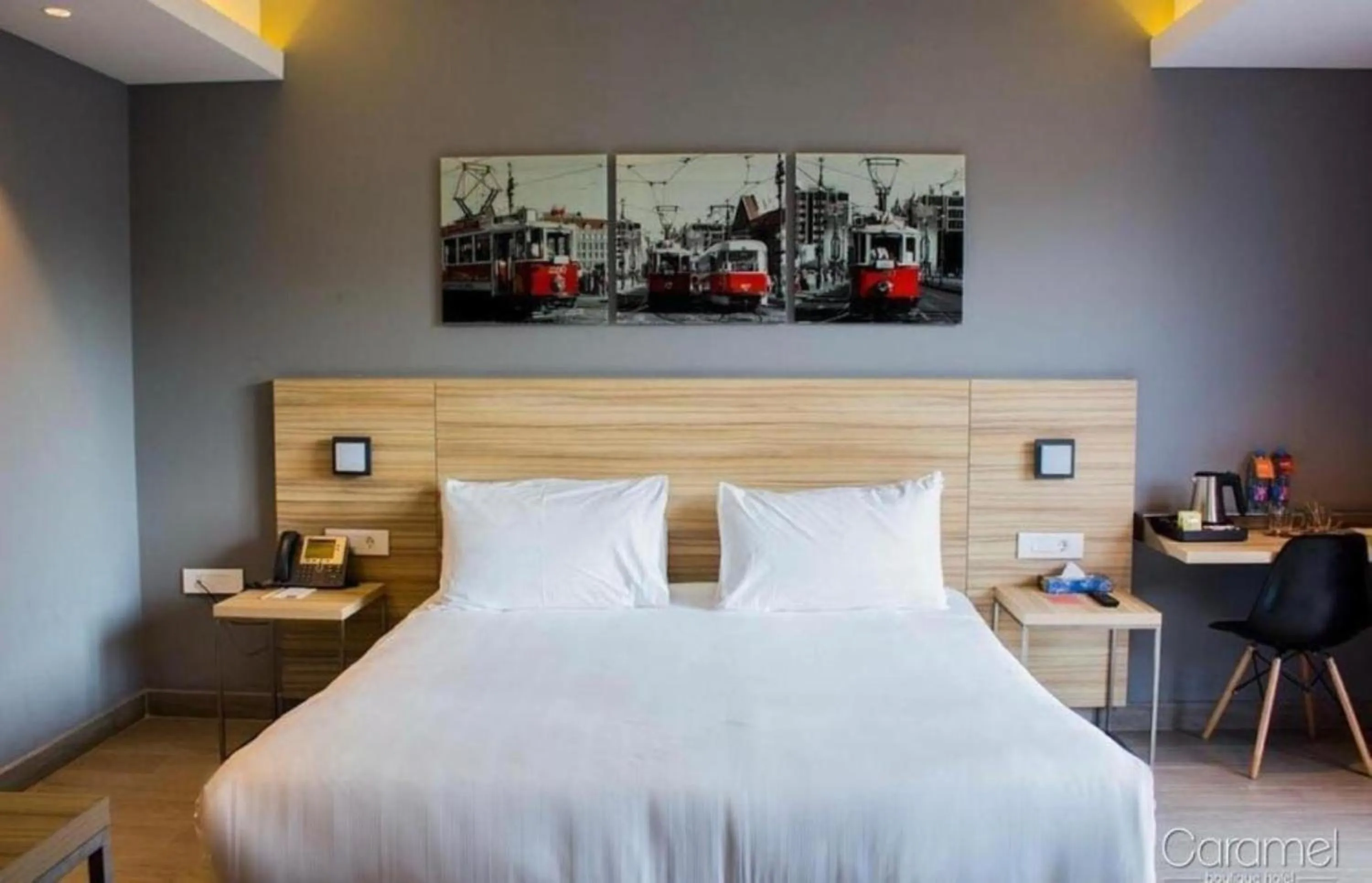 Bed in Caramel Boutique Hotel