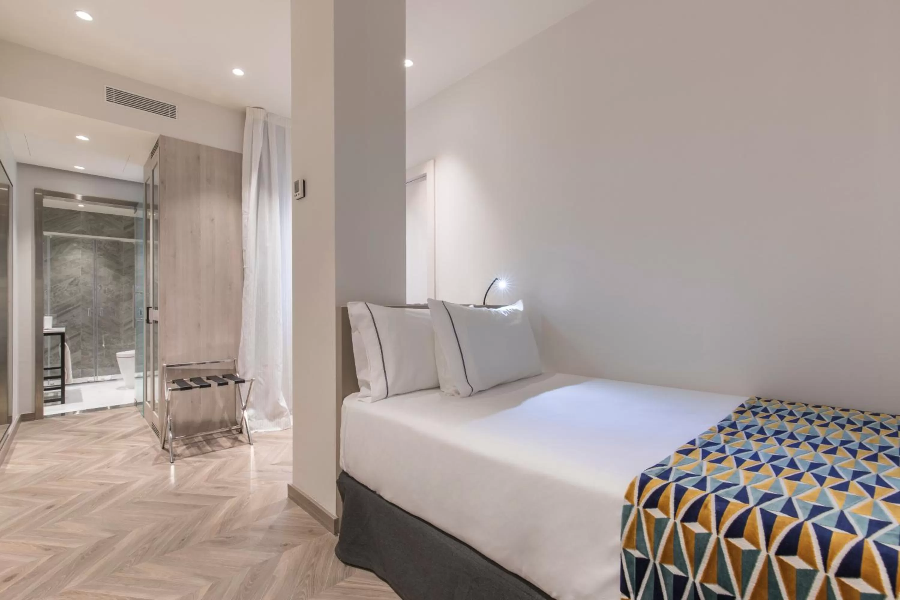 Bed in Eurostars Puerta Real