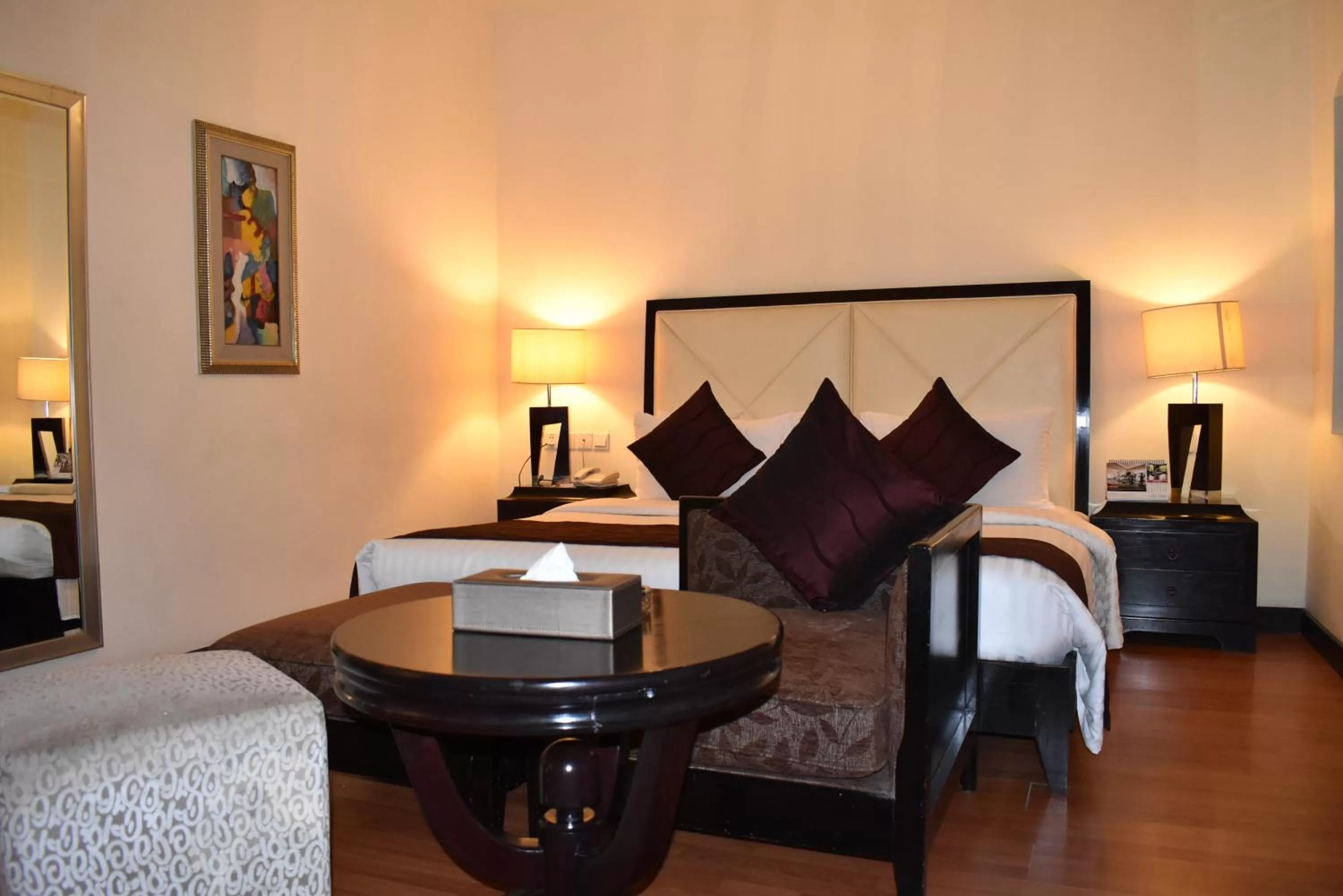 Bed in Ramada Plaza by Wyndham Karachi Airport Hotel