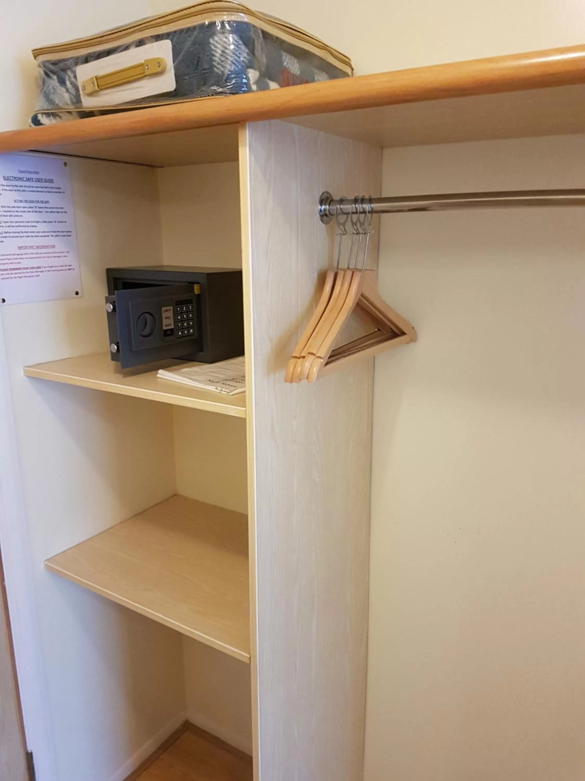 Bedroom in Travel Plaza Hotel