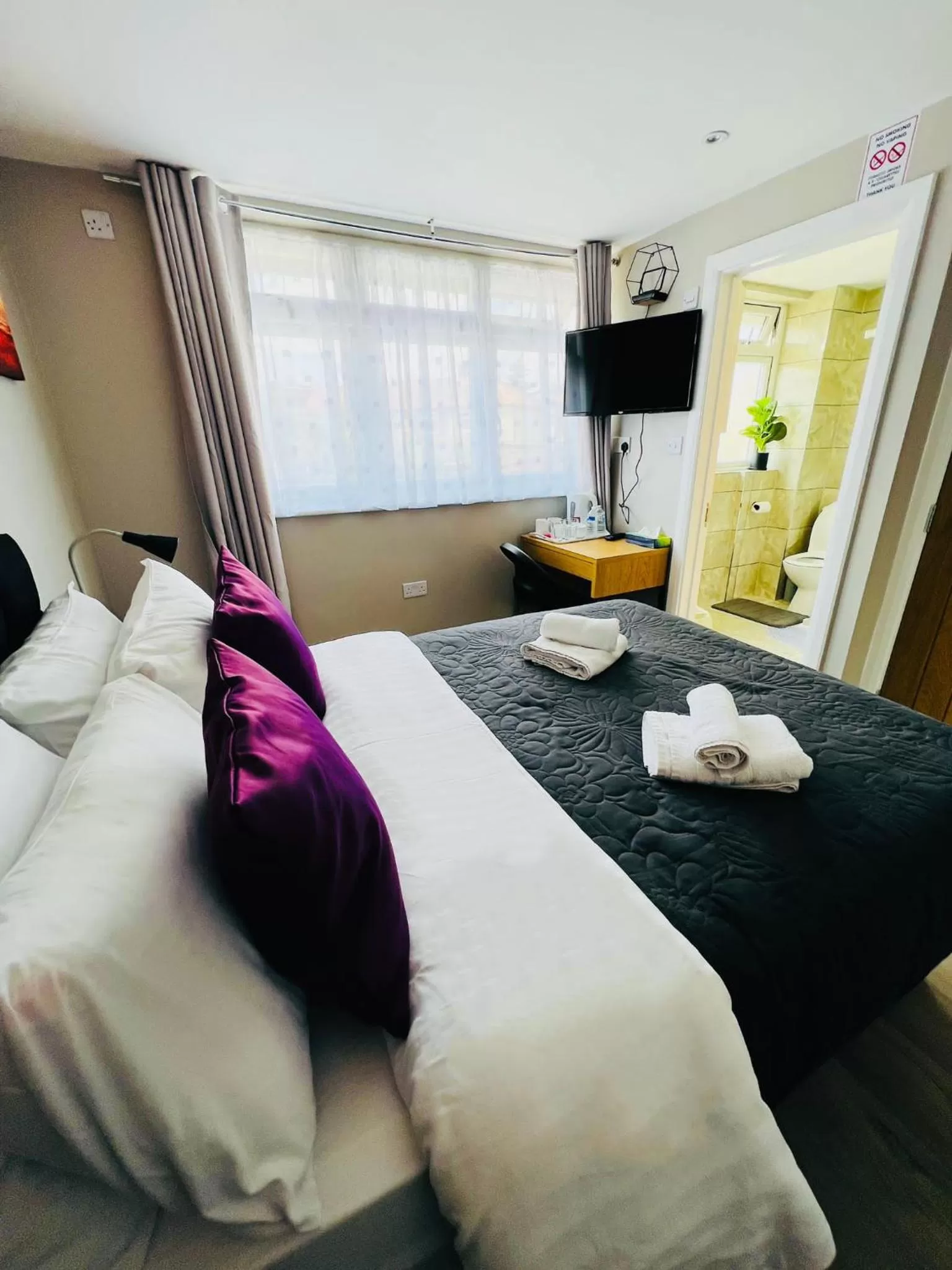 Bed in Indigo Suites