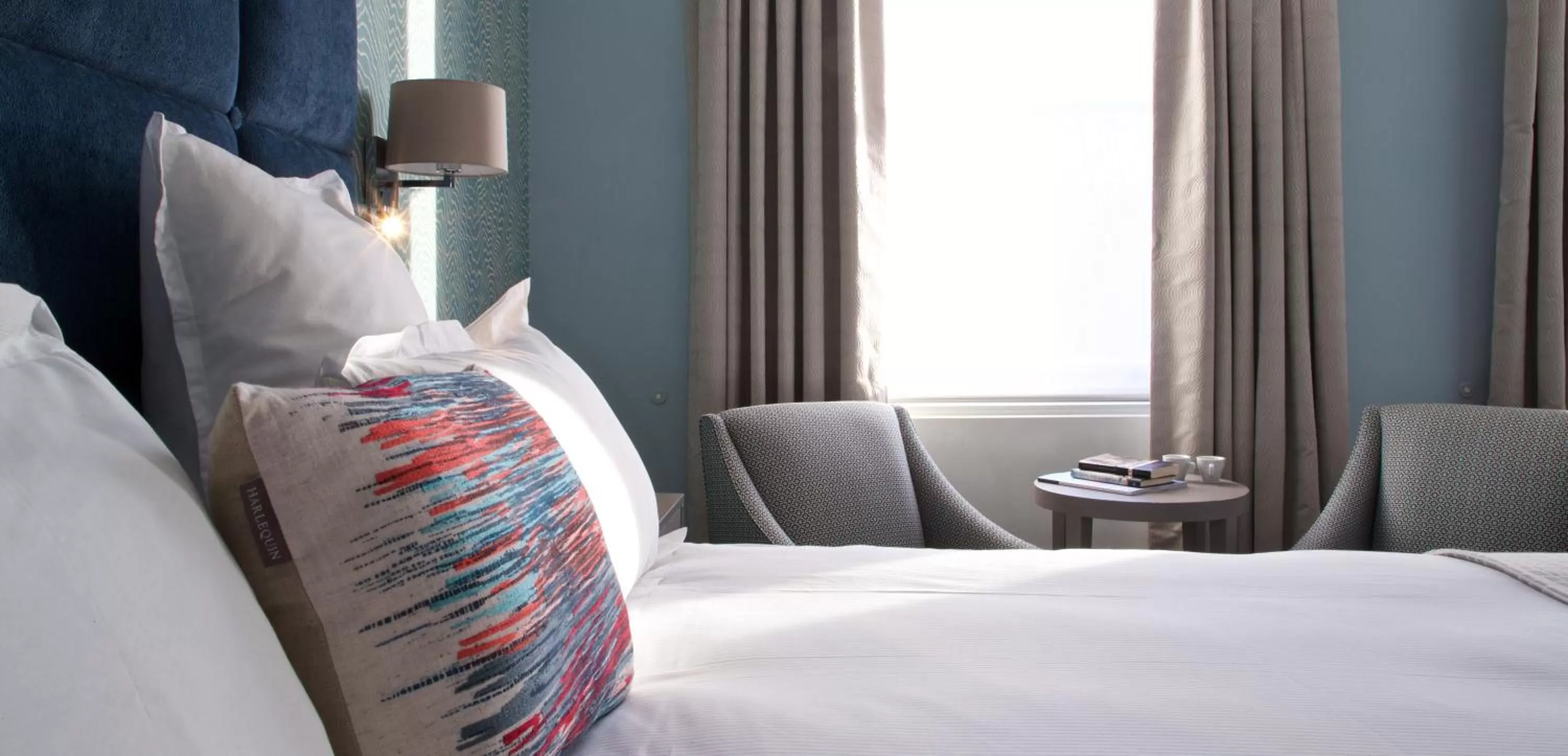 Bed in 54 Queen's Gate Hotel