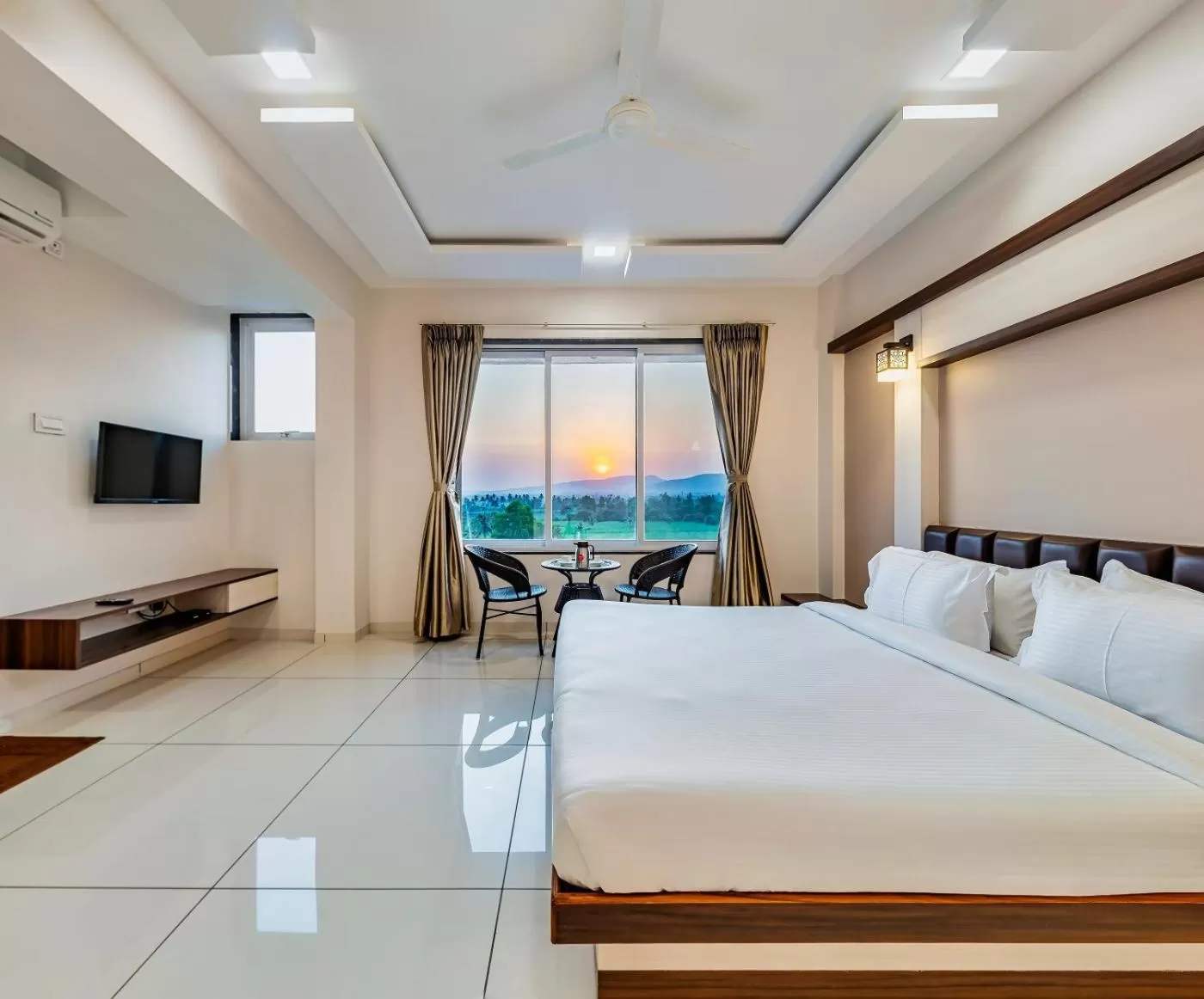 Photo of the whole room, Bed in Hotel Grand Indu, 3 Star Kolhapur