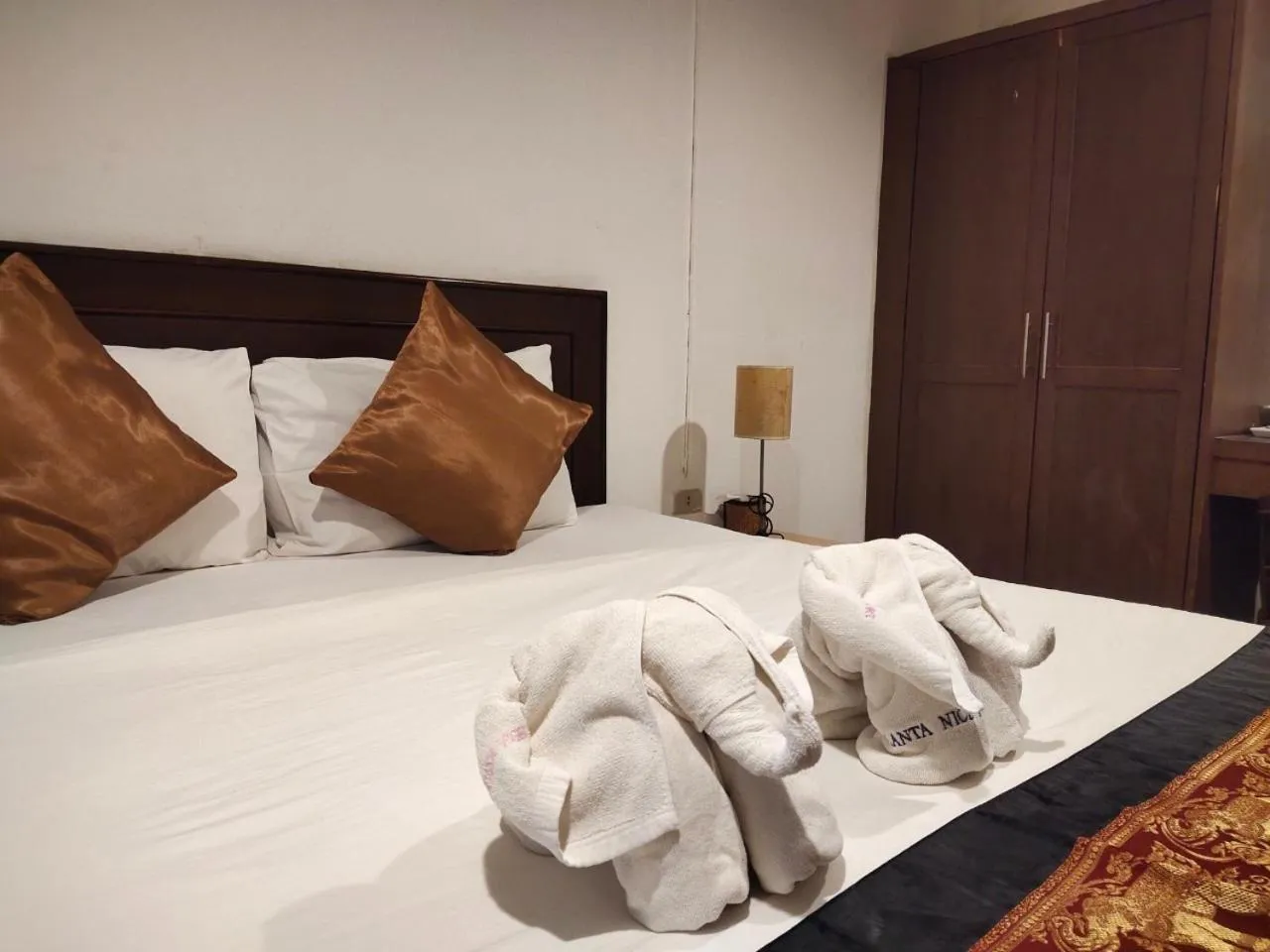 Bed in Lanta Nice Beach Resort - SHA Extra Plus