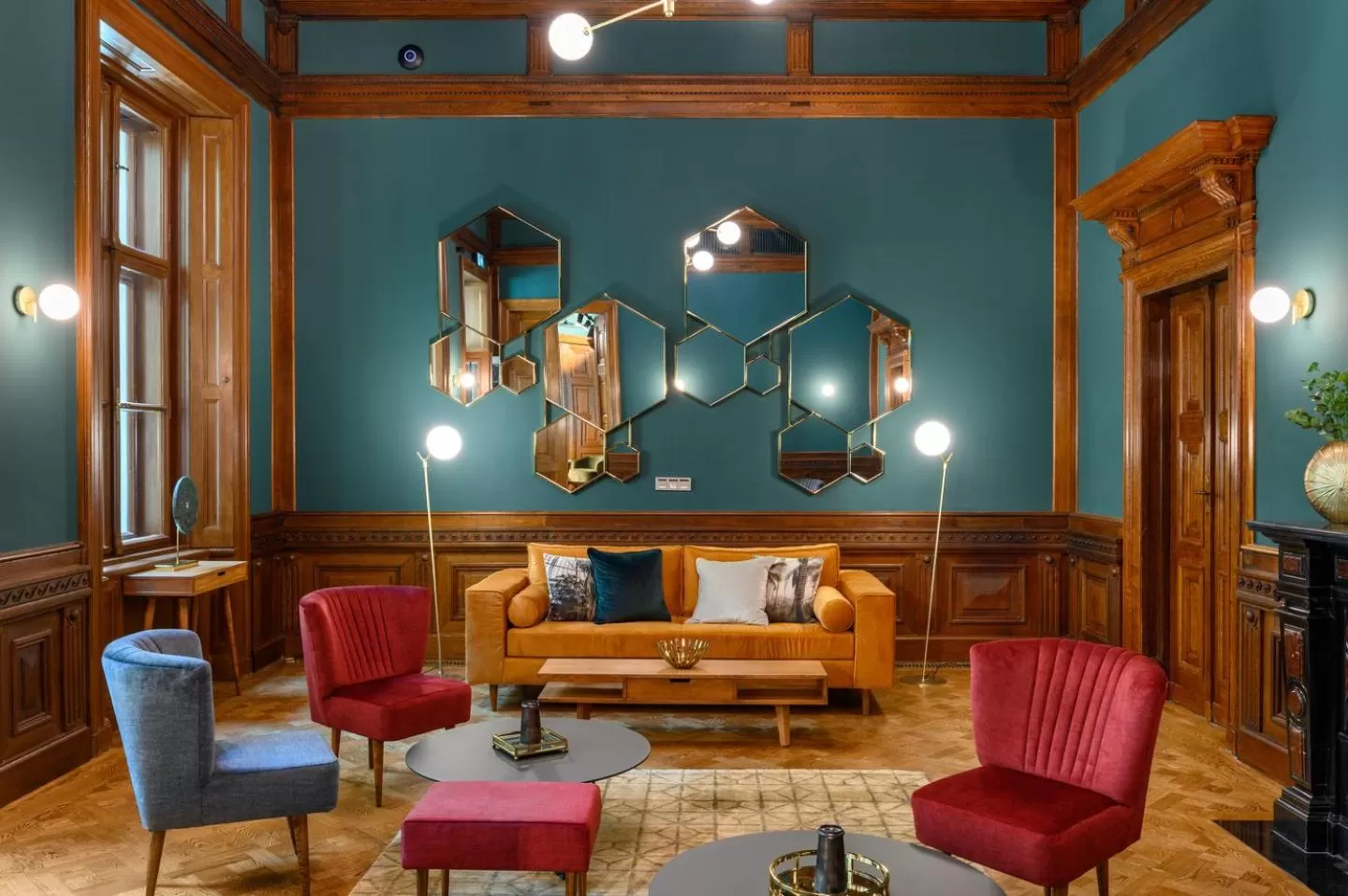 Communal lounge/ TV room in Hotel Oktogon Haggenmacher by Continental Group