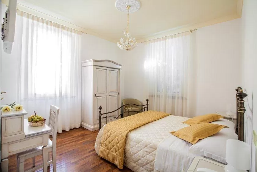 Bed in Il Portico Camere e Caffè - centro Città