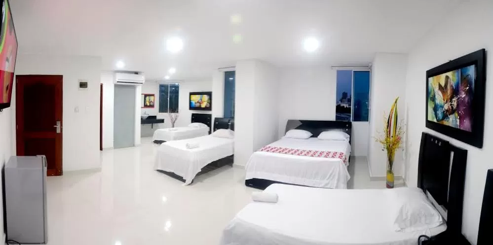 Bed in Hotel Intersuites