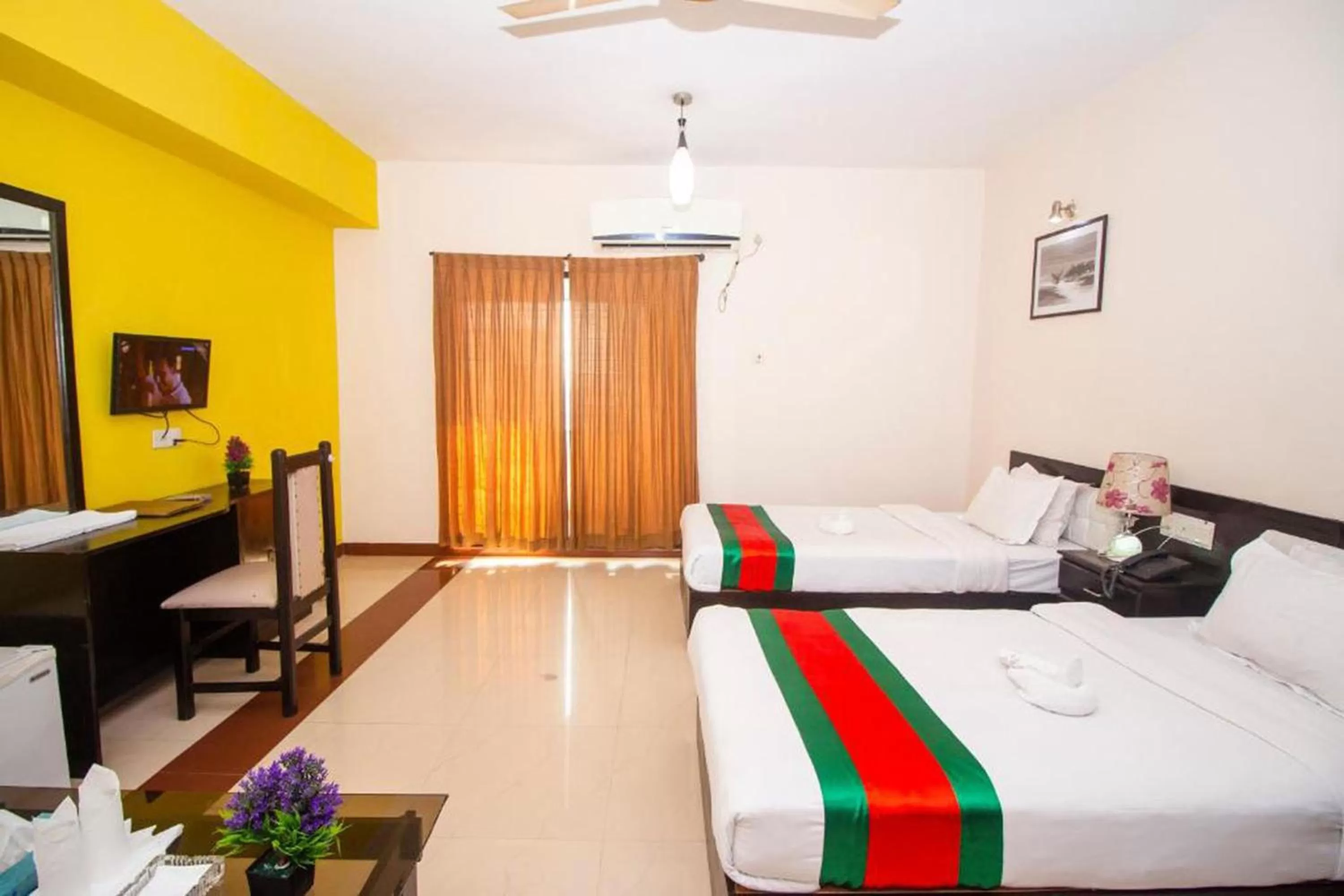 Photo of the whole room, Bed in Central Inn Dhaka City Centre