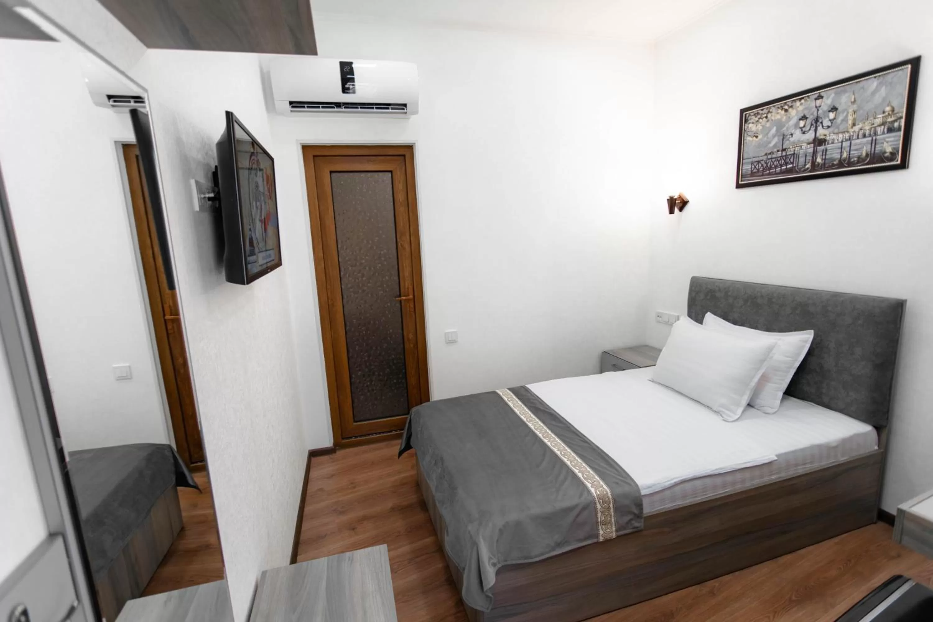 Bed in Registon Saroy Hotel