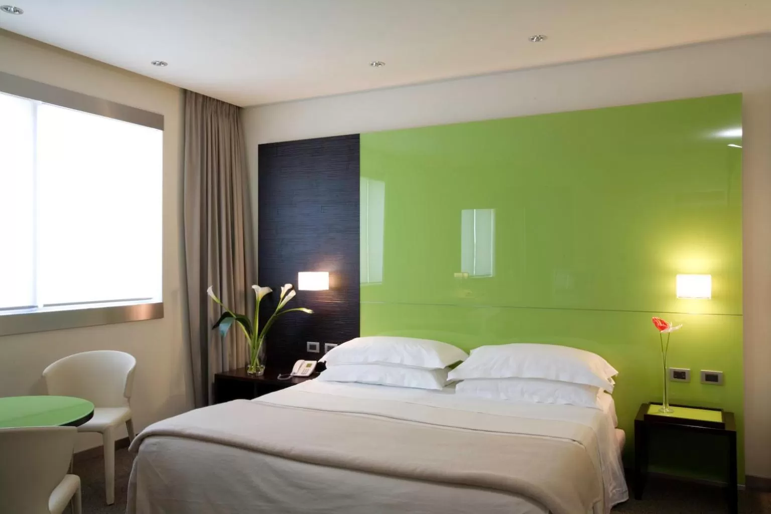 Bed in UNA HOTELS T Hotel Cagliari