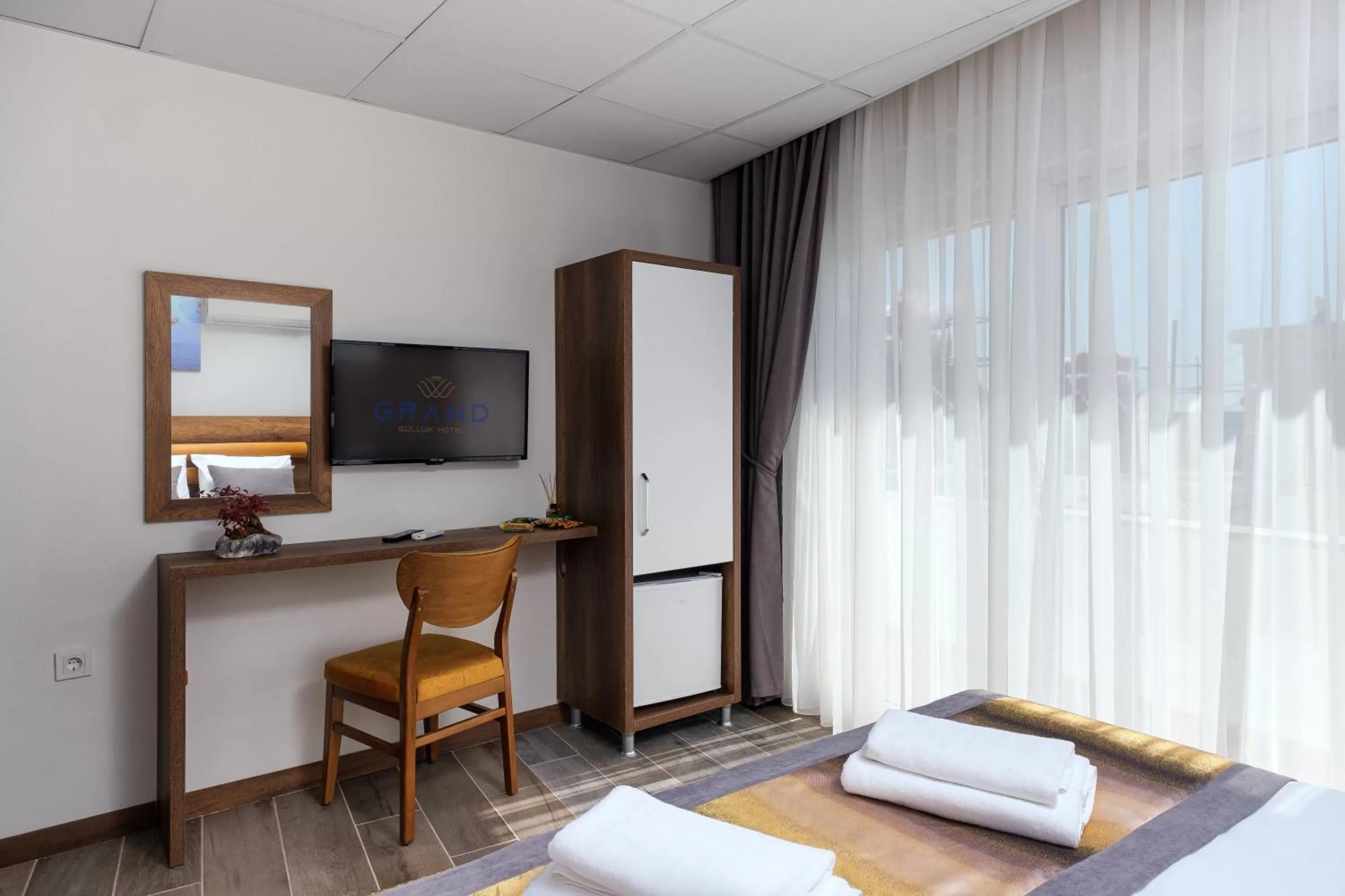 TV and multimedia, Bed in Grand Gulluk Hotel City Center Antalya