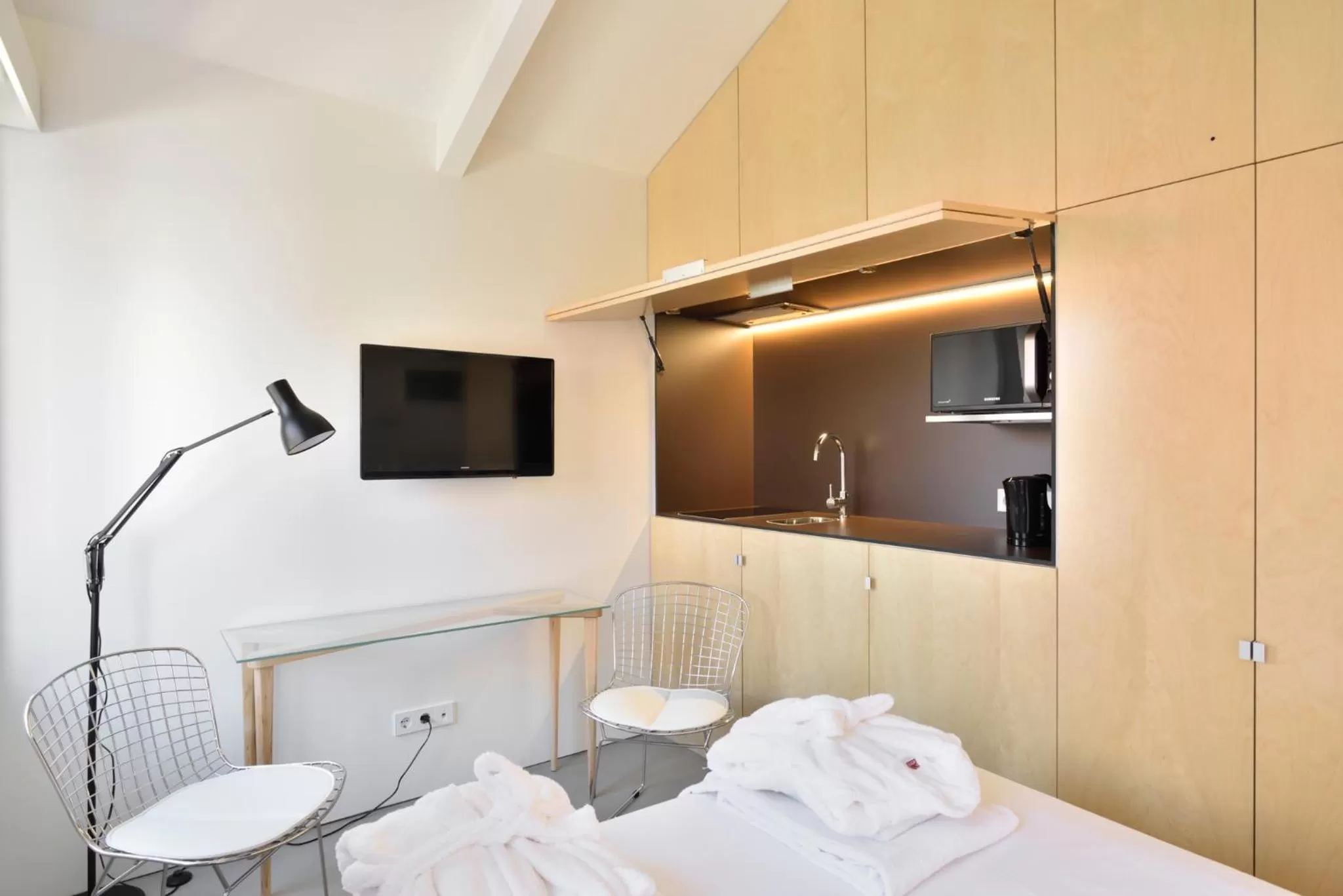 Seating area, Bed in House of Artists