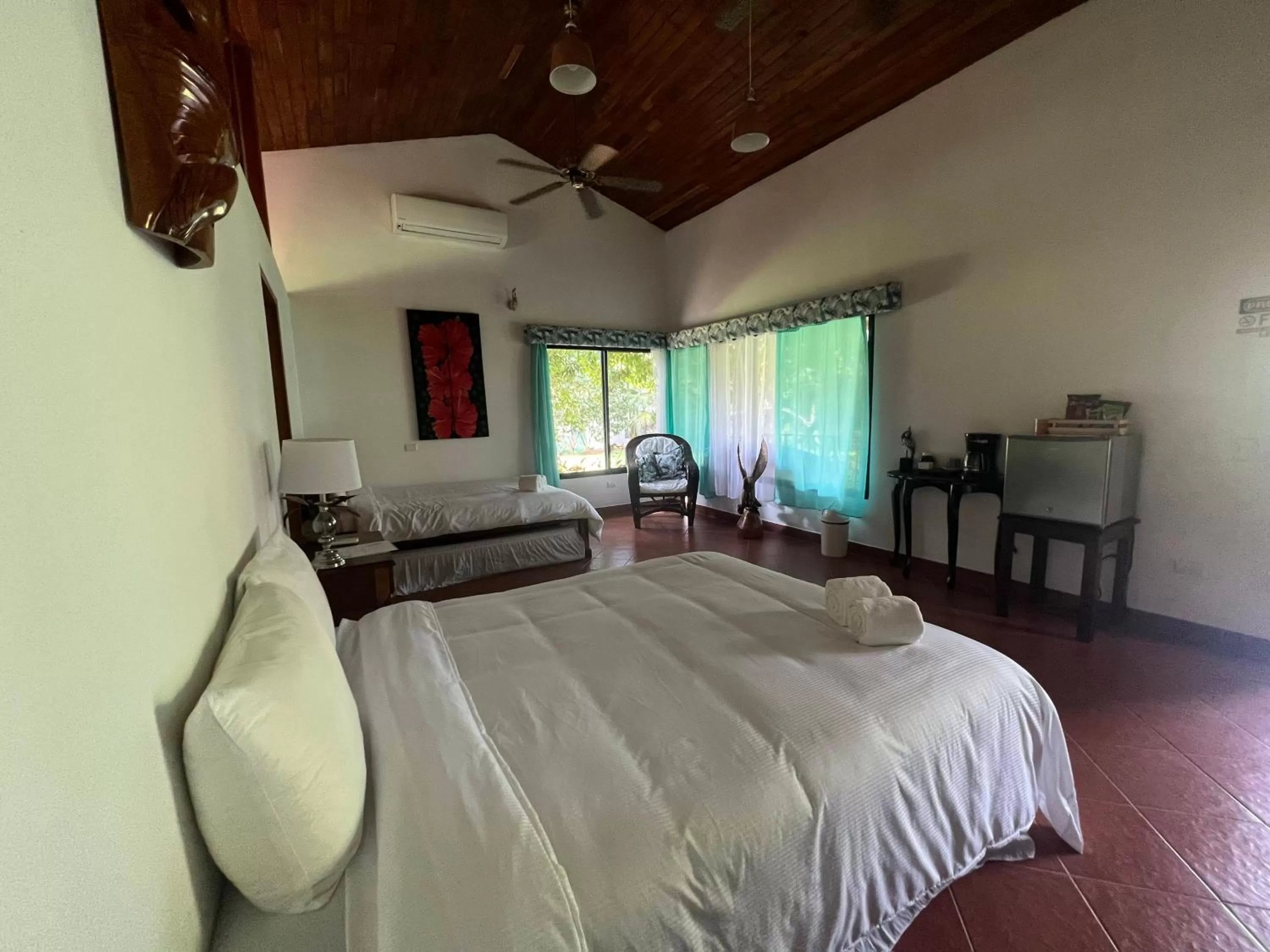 Bed in Blue Banyan Inn