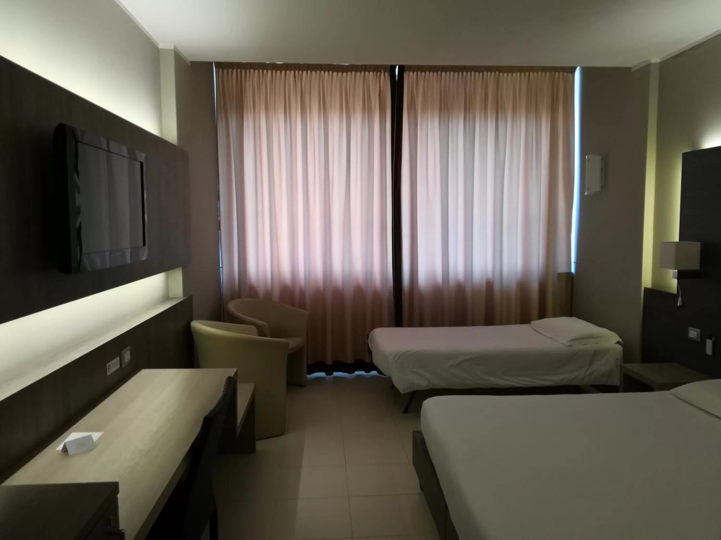 Triple Room in Poggio Hotel