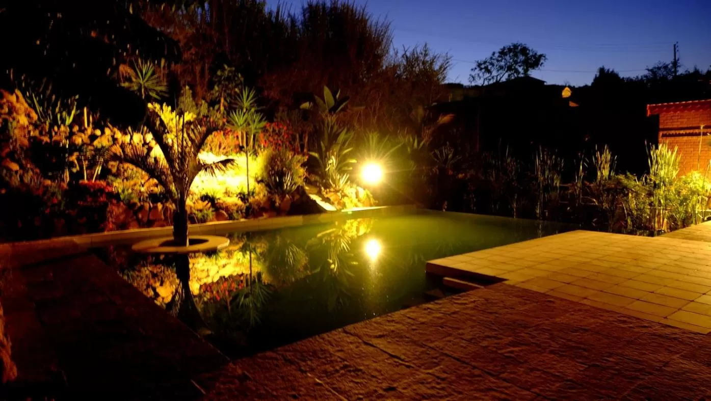 Swimming pool in Eco Lodge Les Chambres Du Voyageur