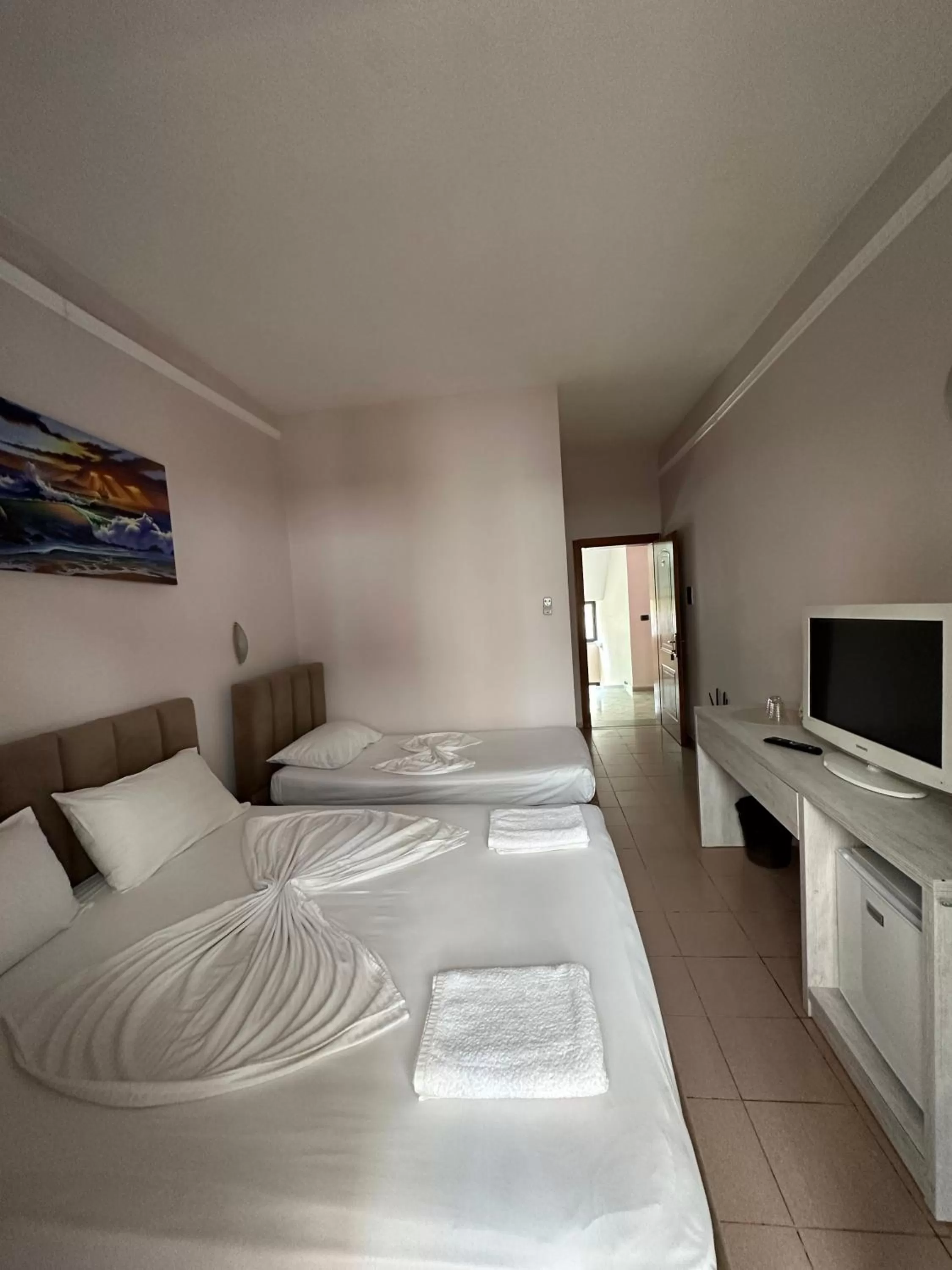 Bed in Seashell Beach Rooms