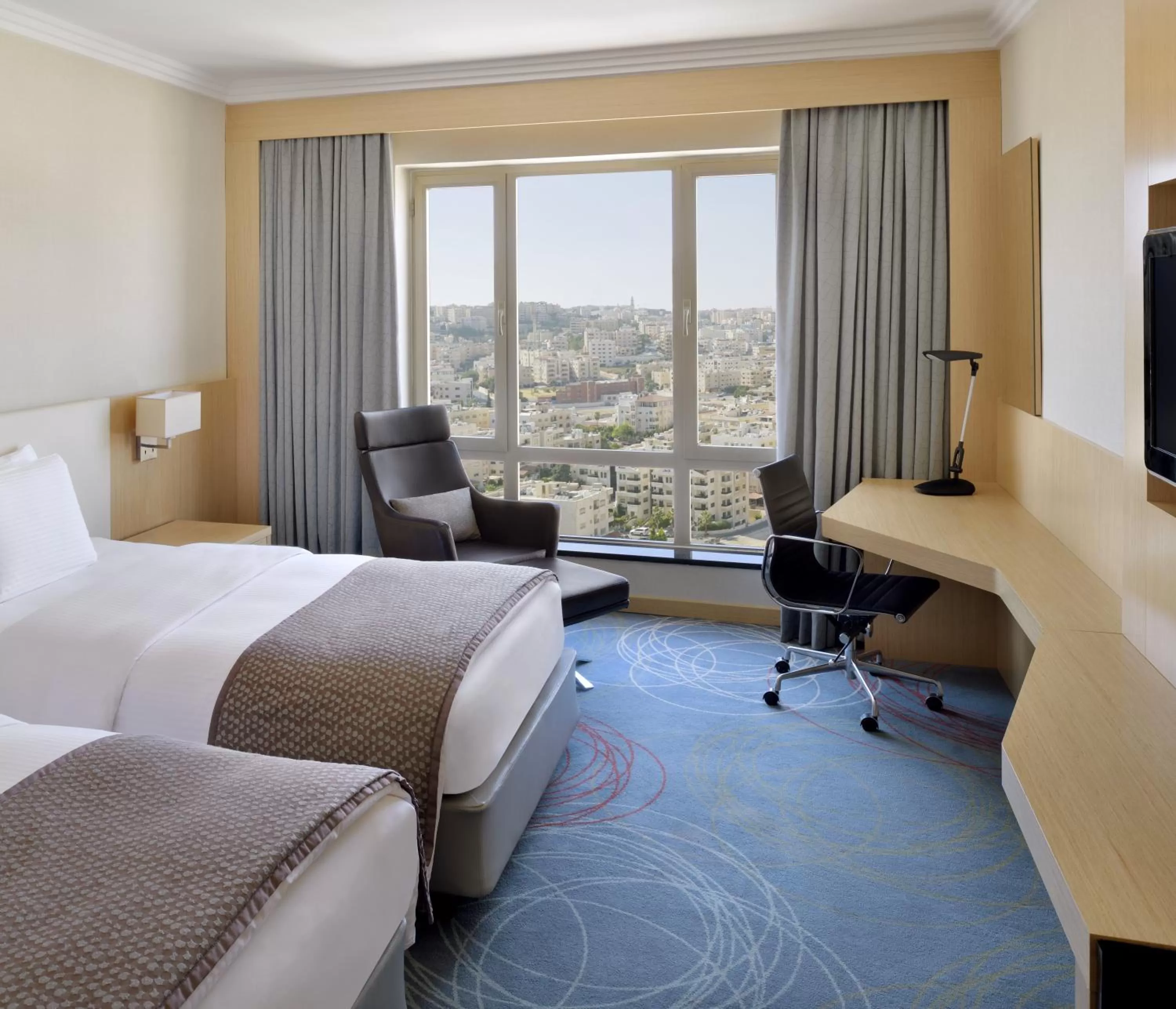 Photo of the whole room, Bed in Mövenpick Hotel Amman