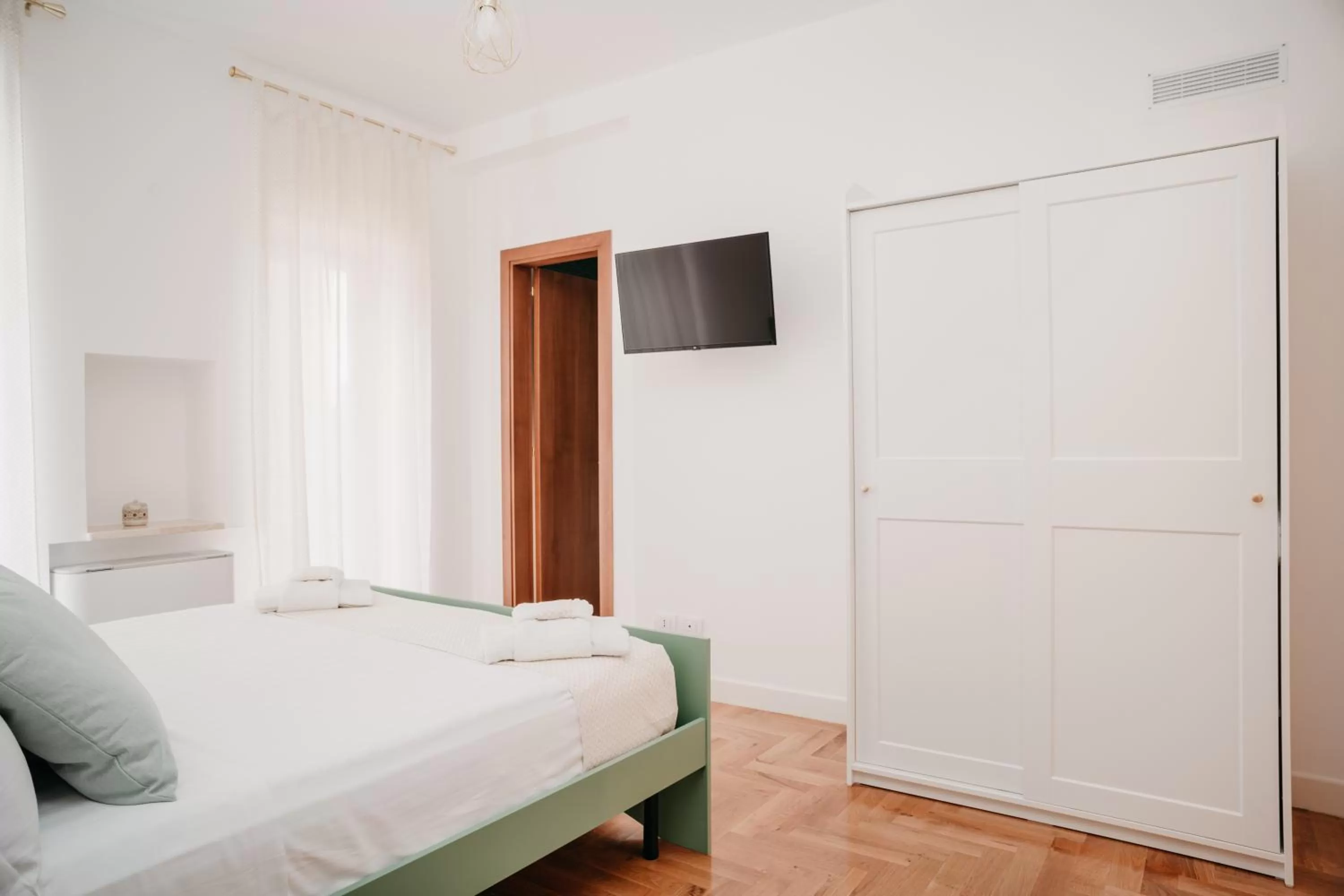 Communal lounge/ TV room, Bed in Vista Napoli Residence by Casa Napoletana