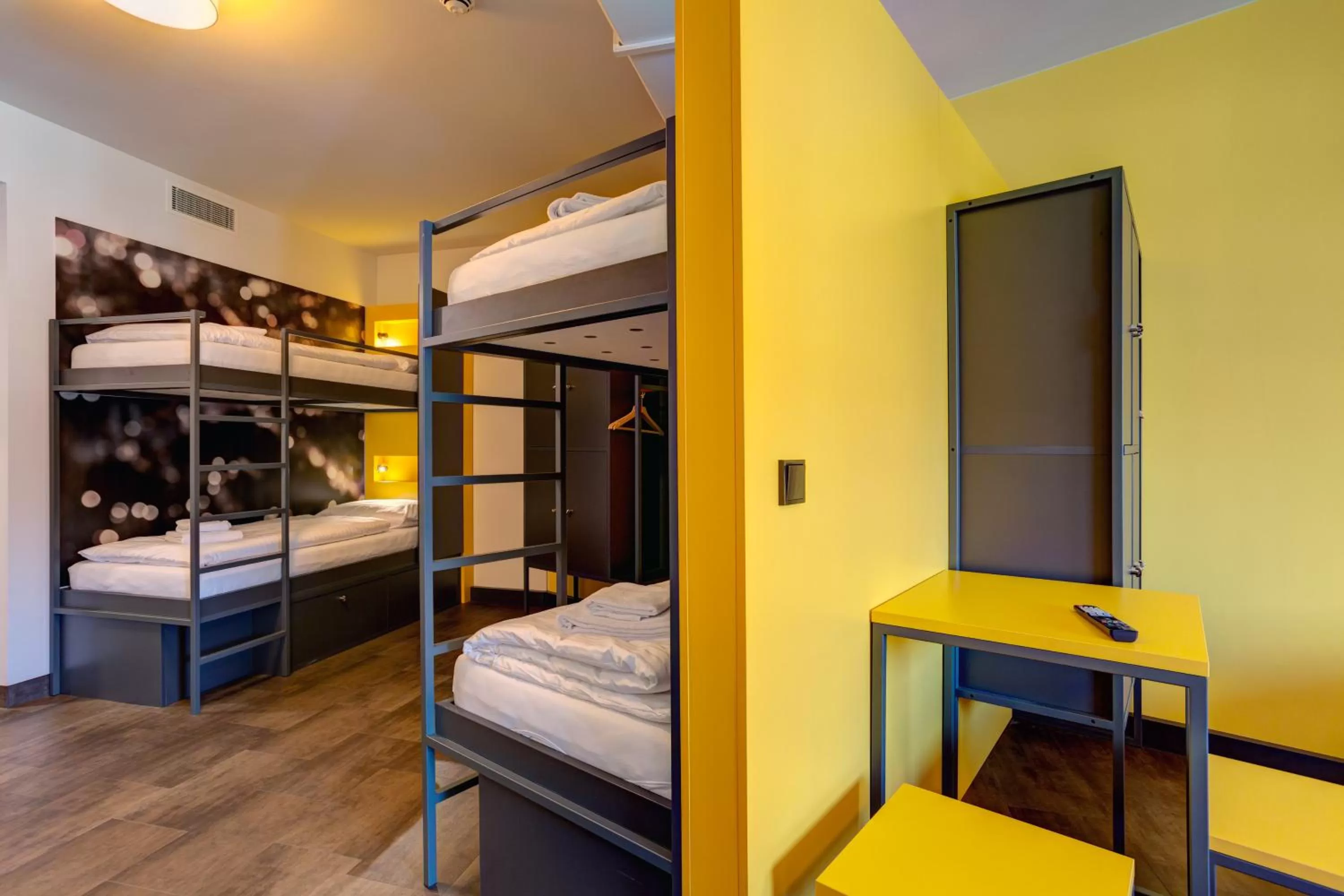 Photo of the whole room, Bed in MEININGER Hotel München Olympiapark