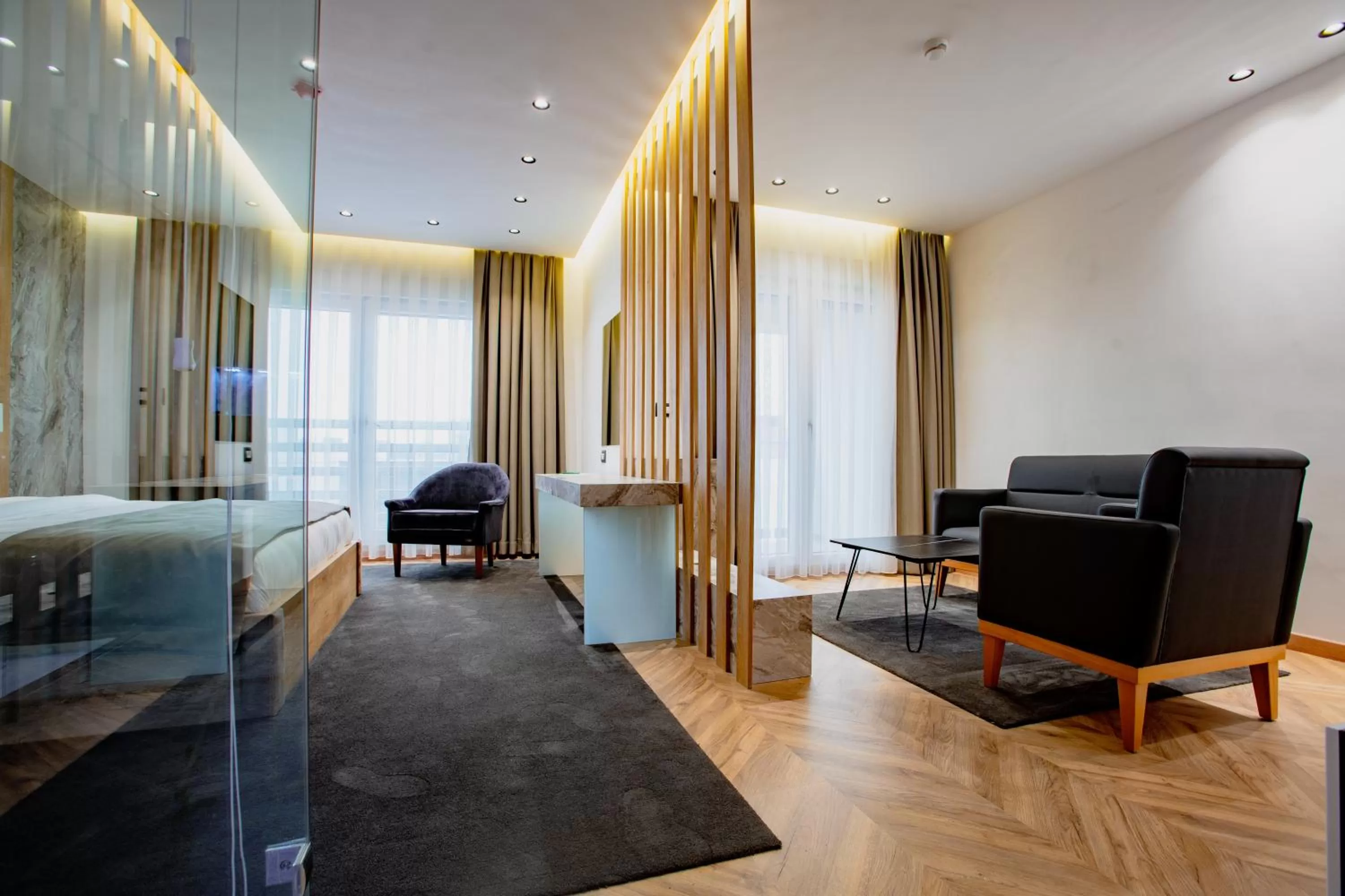 Living room, Bed in Ador Hotel