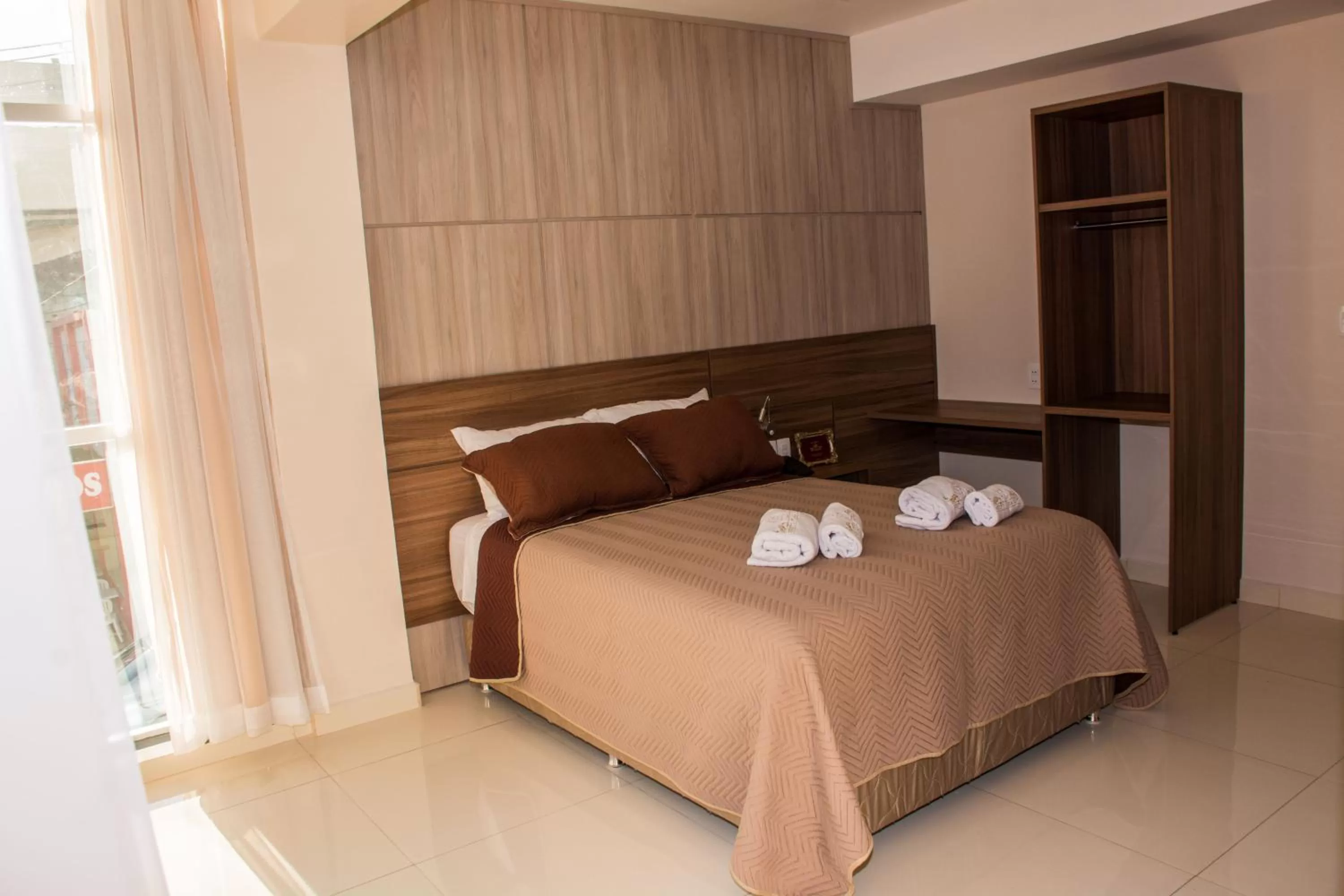 Bed in SERPYL Plaza Hotel