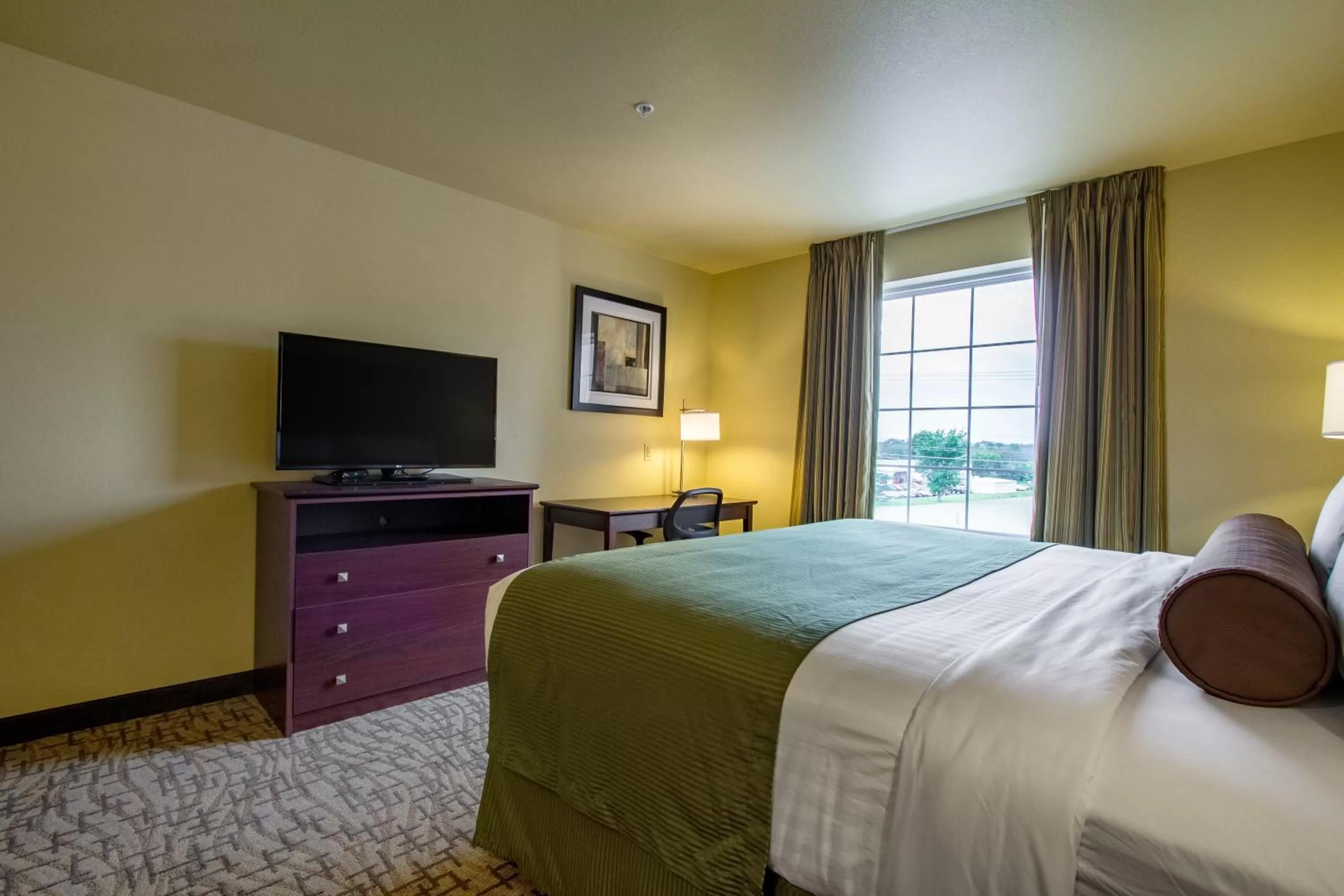 Bedroom, Bed in Cobblestone Hotel & Suites - Orrville