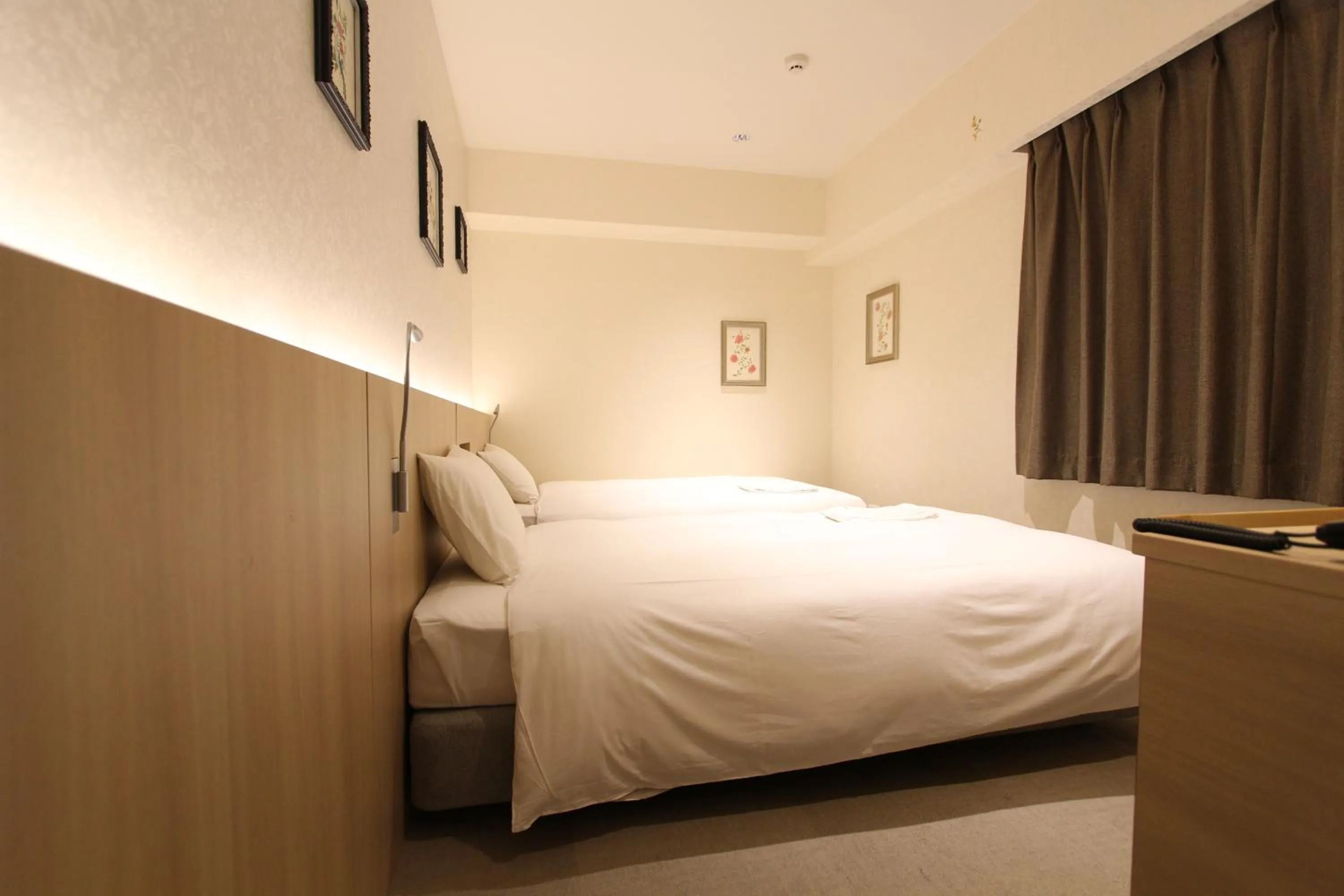 Bed in KOKO HOTEL Osaka Namba Ebisucho