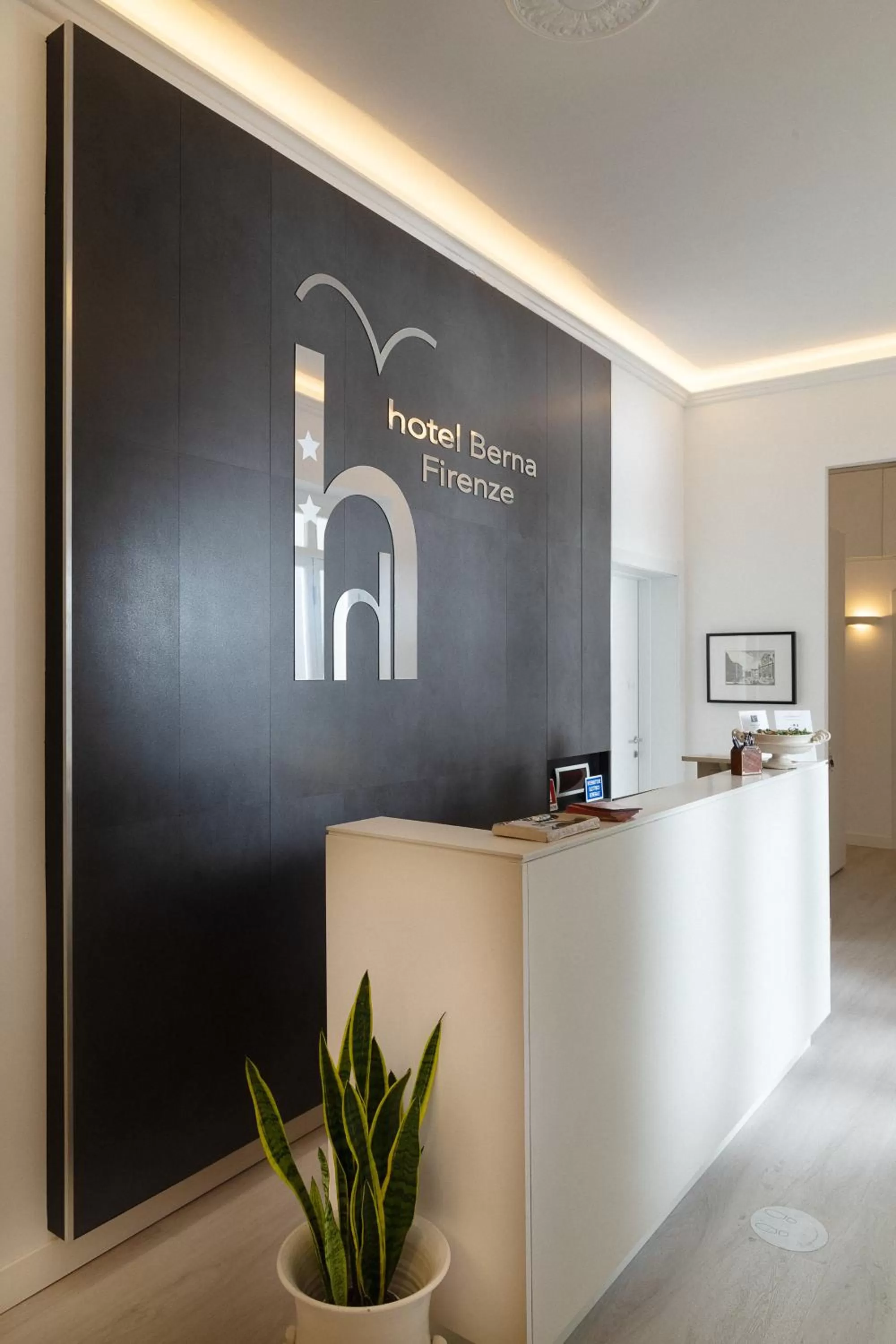 Property logo or sign in Hotel Berna