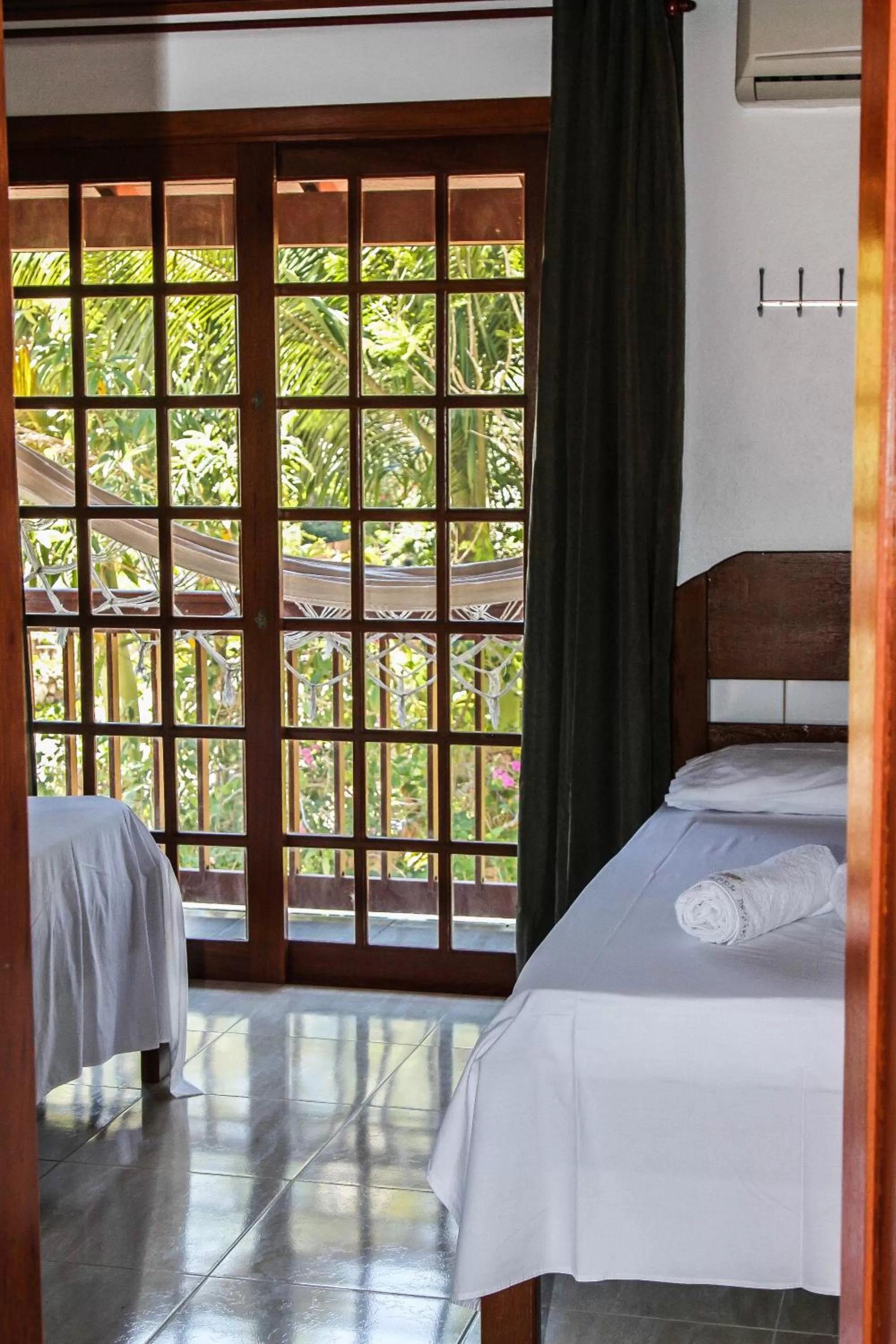 Balcony/Terrace, Bed in Pousada Arquipélago