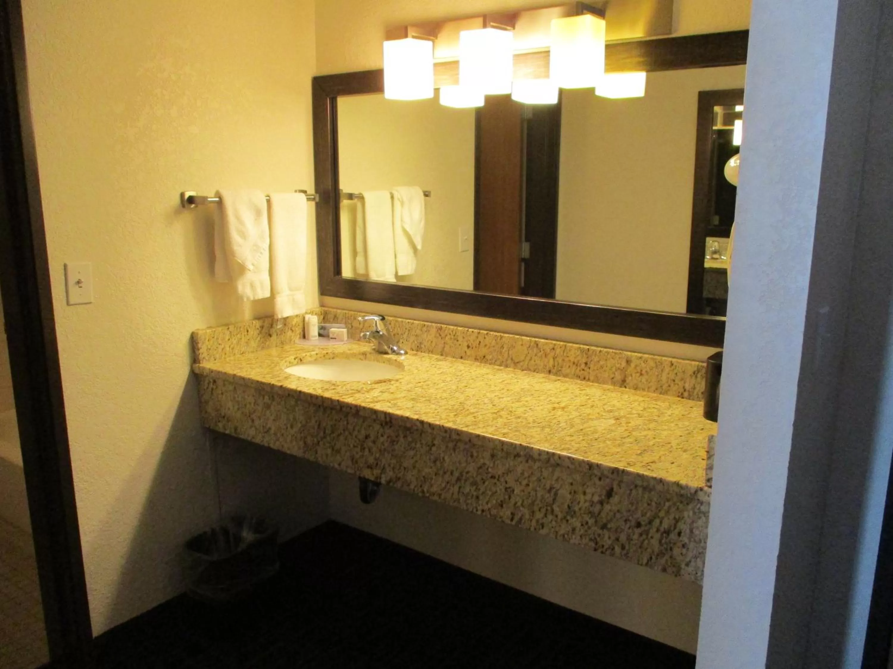 Bathroom in AmericInn by Wyndham Hayward