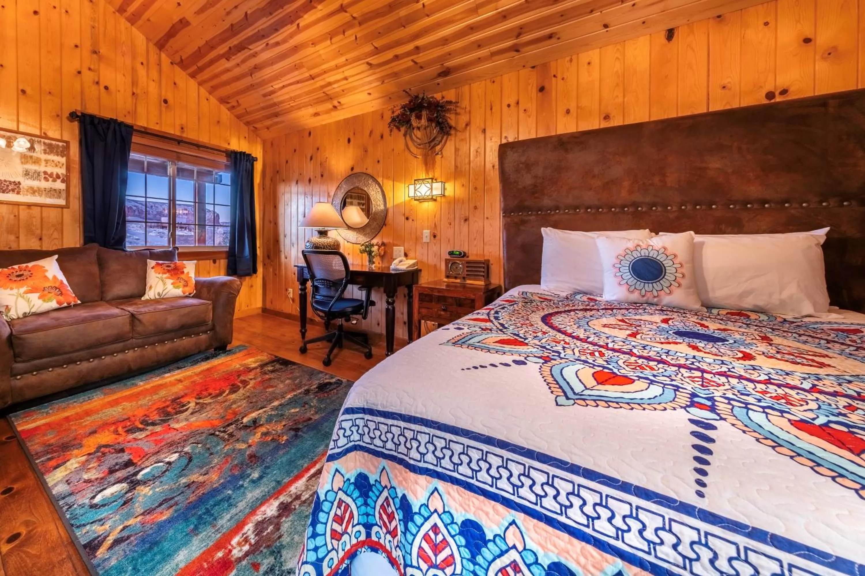 Bed in Desert Rose Resort & Cabins
