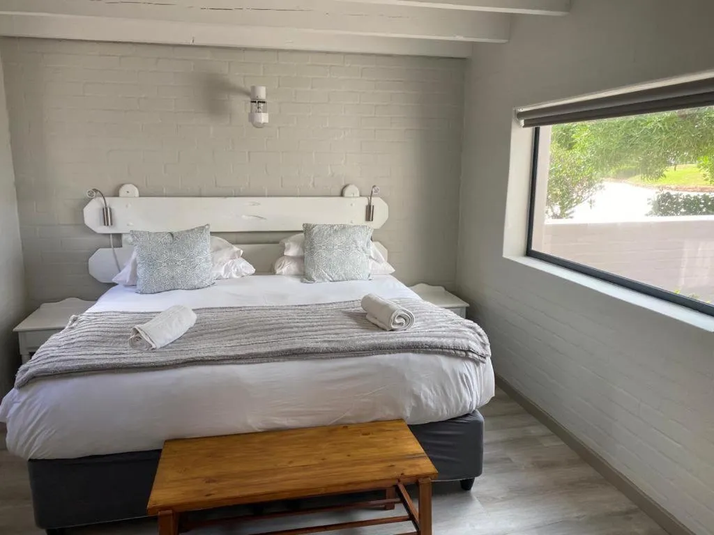 Bed in Blue Bay Lodge