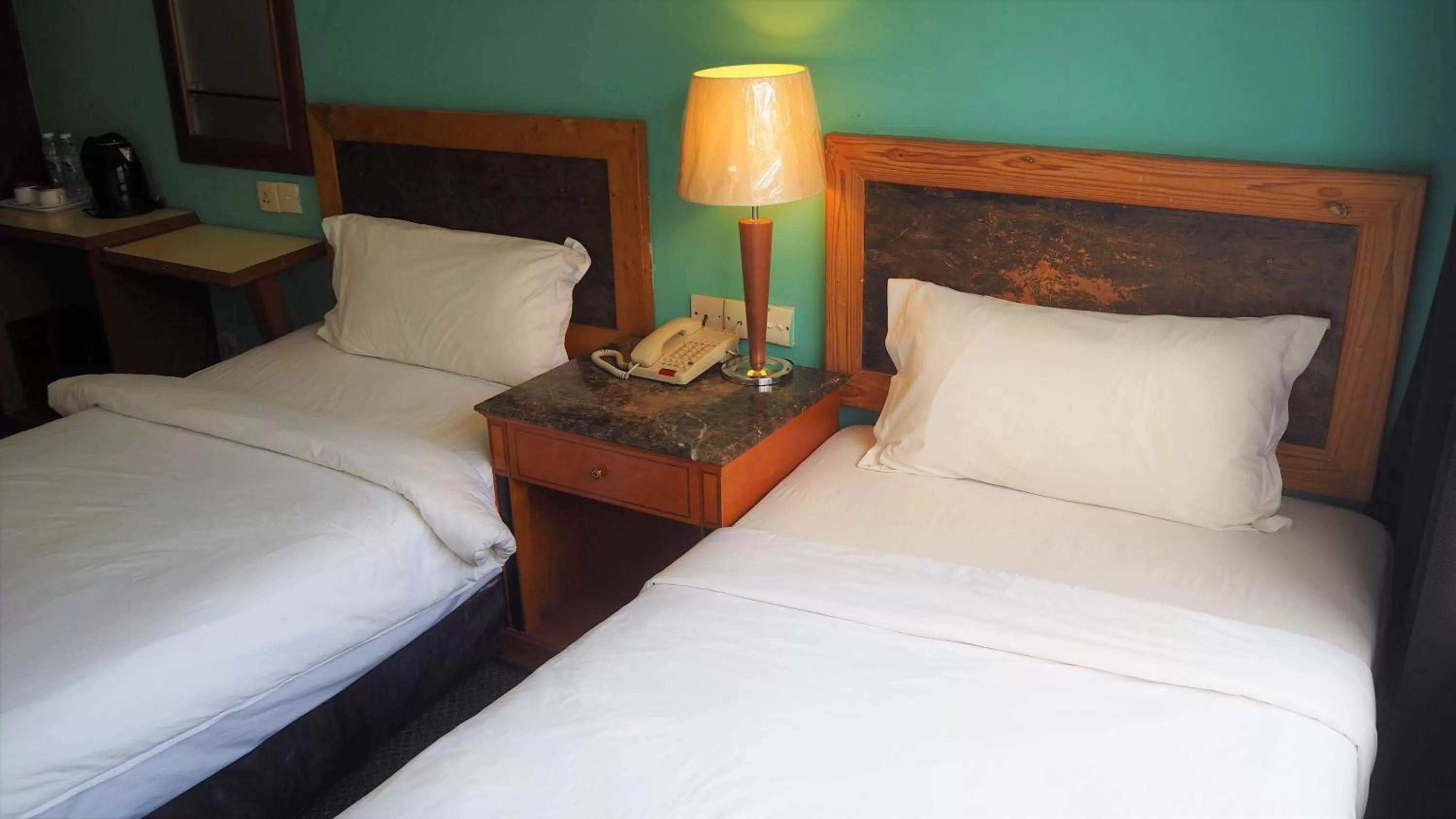 Bed in Leo Palace Hotel Classic Wing, WTC Kuala Lumpur