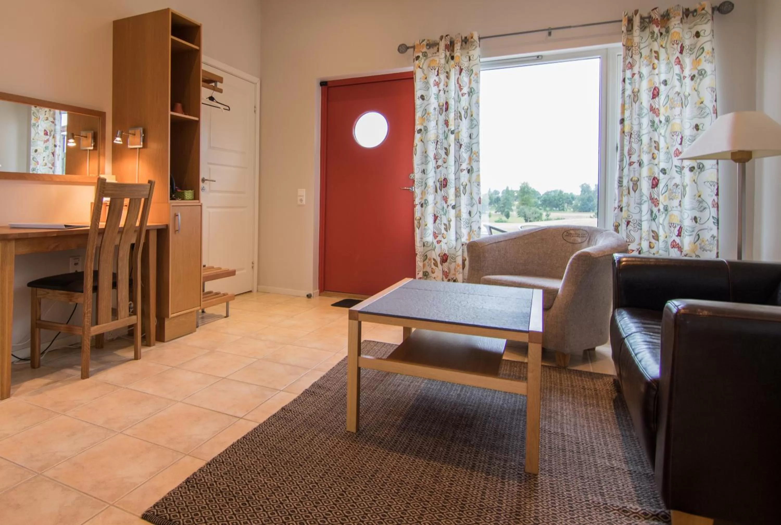 Living room in Tomelilla Golf Hotell